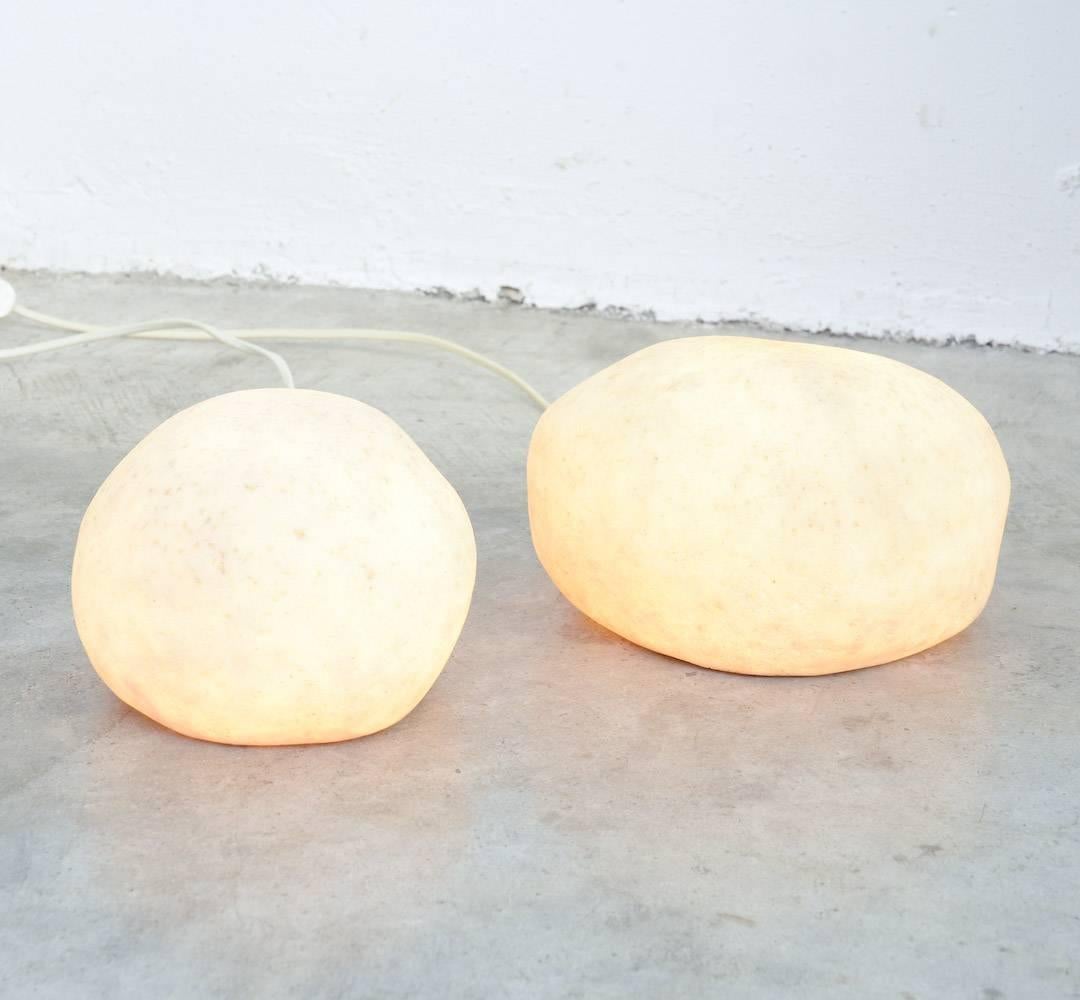 The Dorra rock shaped lamp was designed by André Cazenave in 1969 for Atelier A.
Both lamps are completely made of resin with marble powder.
These early lamps are in very good condition, all original.
They are marked with a label on the resin