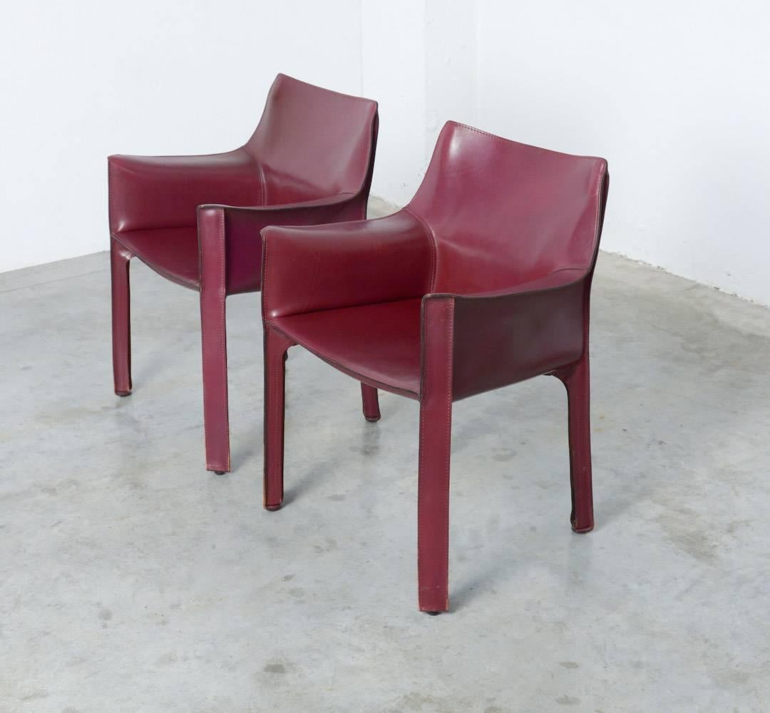 These very beautiful and luxury original CAB chairs are designed by Mario Bellini in 1977 for Cassina, Italy.
The CAB chair has an enamelled steel frame, the leather upholstery is zippered over the frame. This luxury armchair in strong leather is