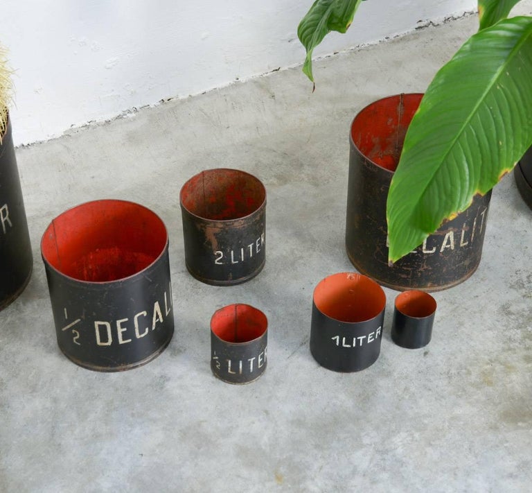 Decorative Set of 8 Vintage Metal Measuring Cups For Sale at 1stDibs