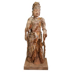 Bodhisattva Guanyin in legno intagliato, risalente agli inizi della dinastia Ming, Cina, 1400 circa