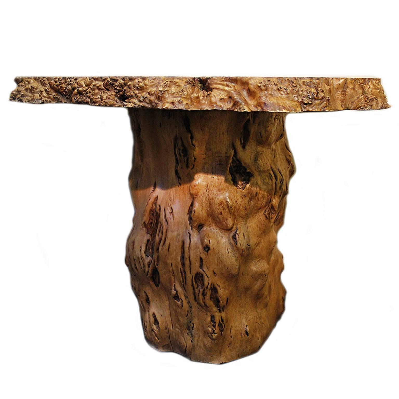 Natural Rootwood form console table with scalloped edge top.

Dimensions: 33.07 in. H x 41.33 in. W x 33.46 in. D
84 cm. H x 105 cm. W x 85 cm. D.