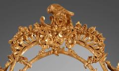 Important Carved and Gilded Wood Regence Style Mirror