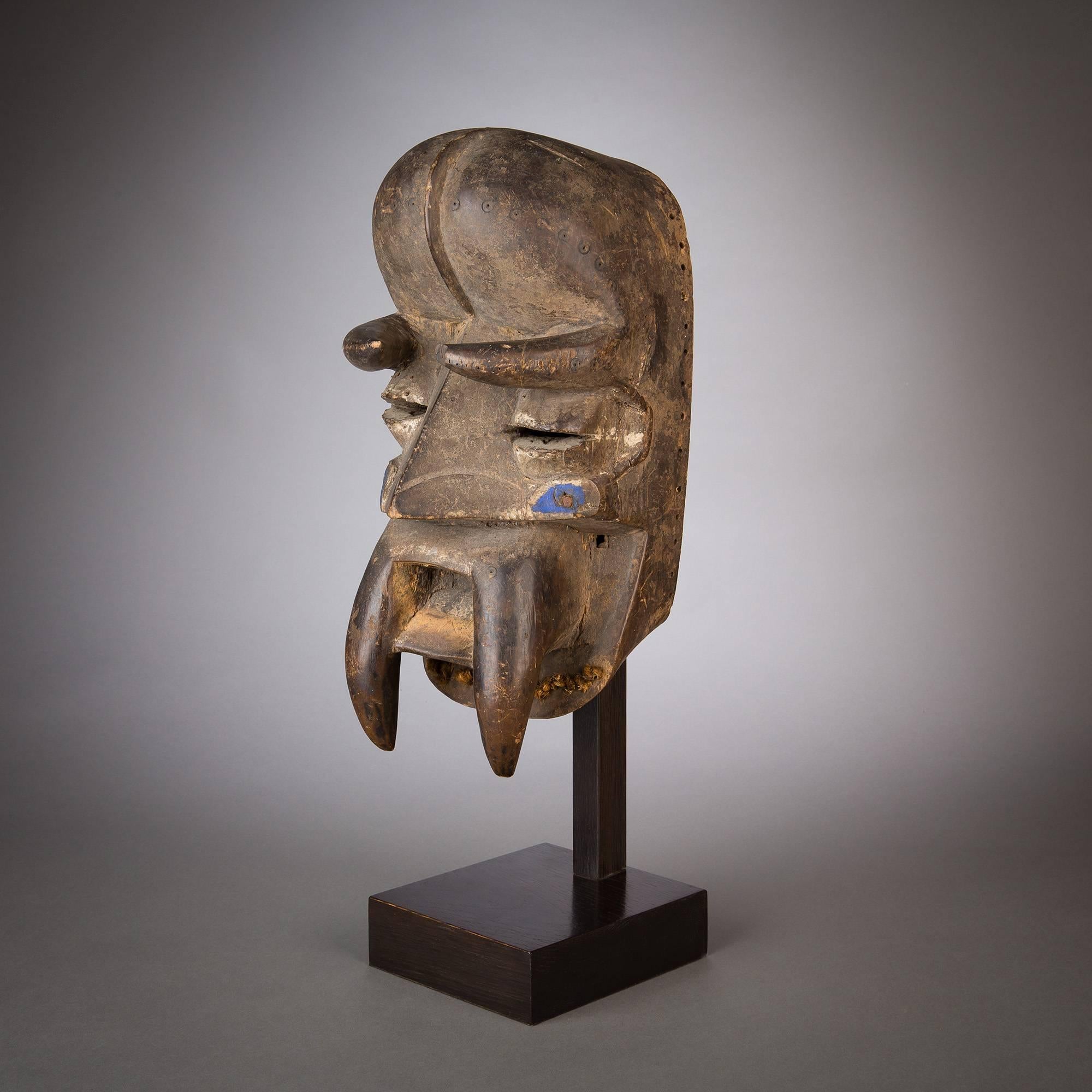 With their tusk-like protrusions, and imposing visages, the gre masks of the Bete are amongst the most visually striking works from the Côte d'Ivoire. Used in rites marking the restoration of peace as well as preparation for war, these gripping