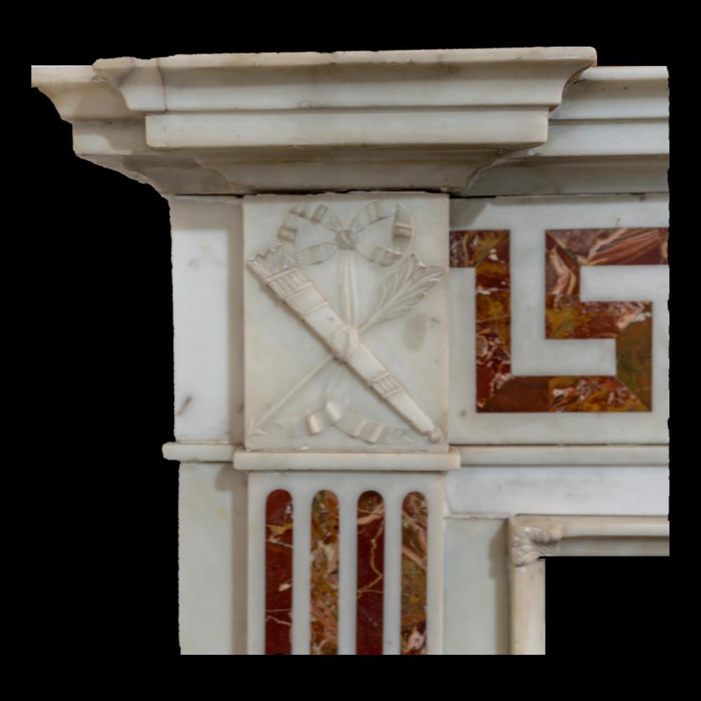 Antique English Statuario Marble Mantel with Jasper Inlay. 
18th Century Elegant and richly detailed, this stately English fireplace mantel features fine Statuario marble accented with deep red jasper inlay. Classical motifs, including a central urn
