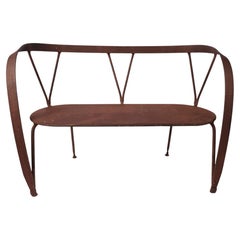 Panchina in ferro battuto in stile neo-primitivo di Andrea Branzi, design italiano