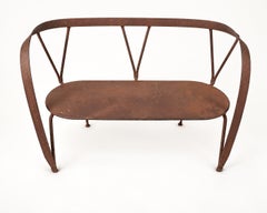 Panchina in ferro battuto in stile neo-primitivo di Andrea Branzi, design italiano