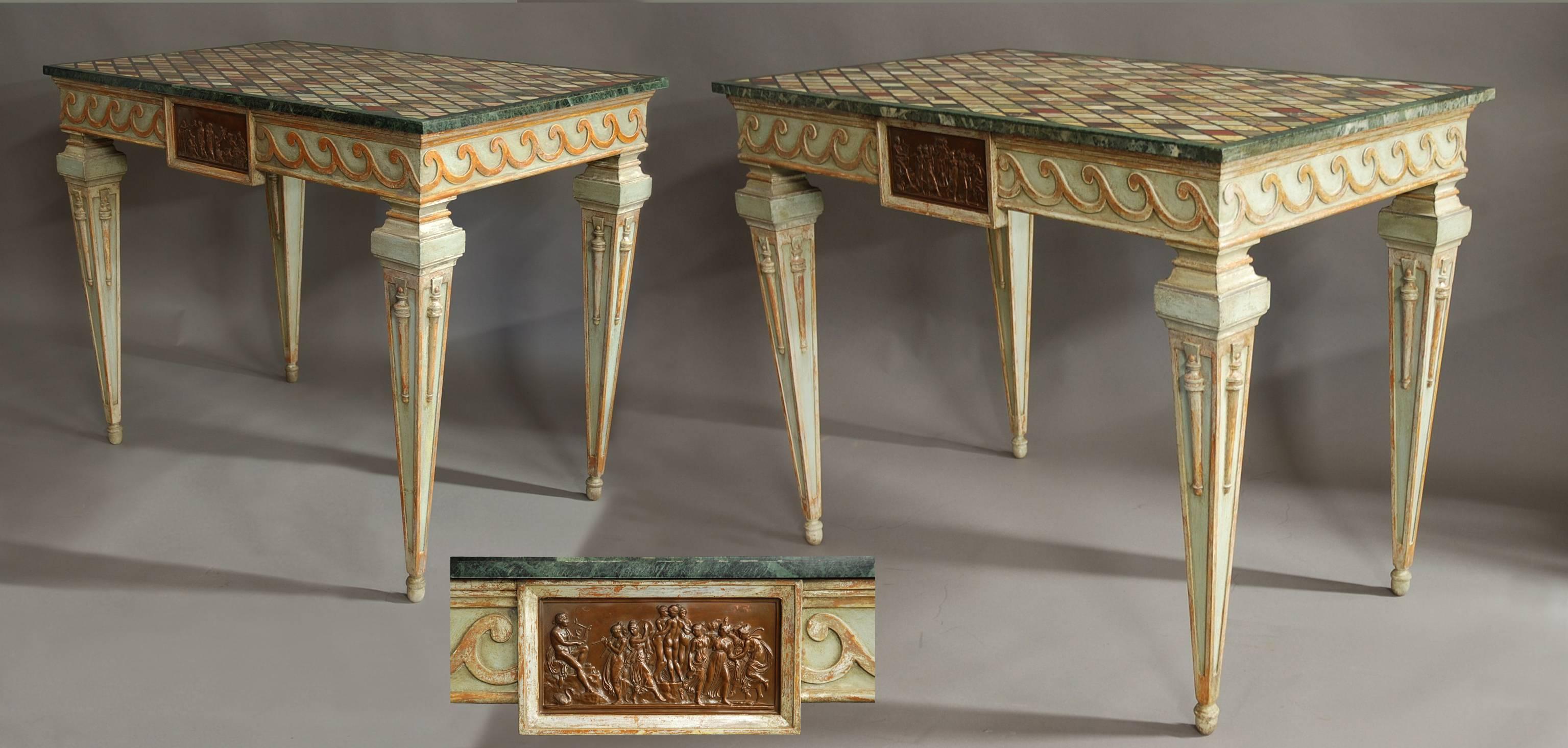 A highly decorative pair of early 20th century Italian painted console tables with specimen marble tops.

These tables consist of highly decorative specimen marble tops with various inlaid stones and marbles to create a lattice design.

These