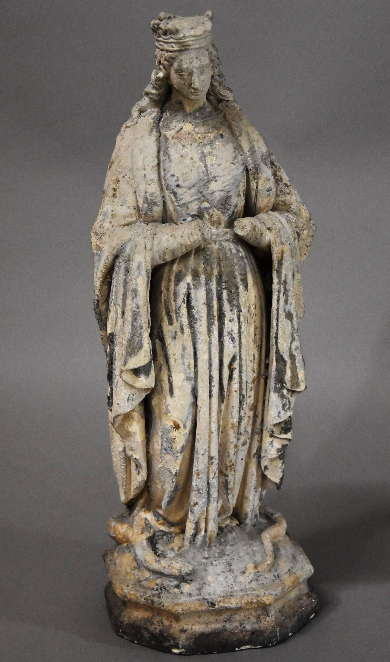 A French late 17th century limestone niche sculpture of the Virgin Mary with traces of limewash probably from Northern France.

This sculpture depicts the Virgin Mary with a crown adorning her head, her long hair on her back, wearing draping