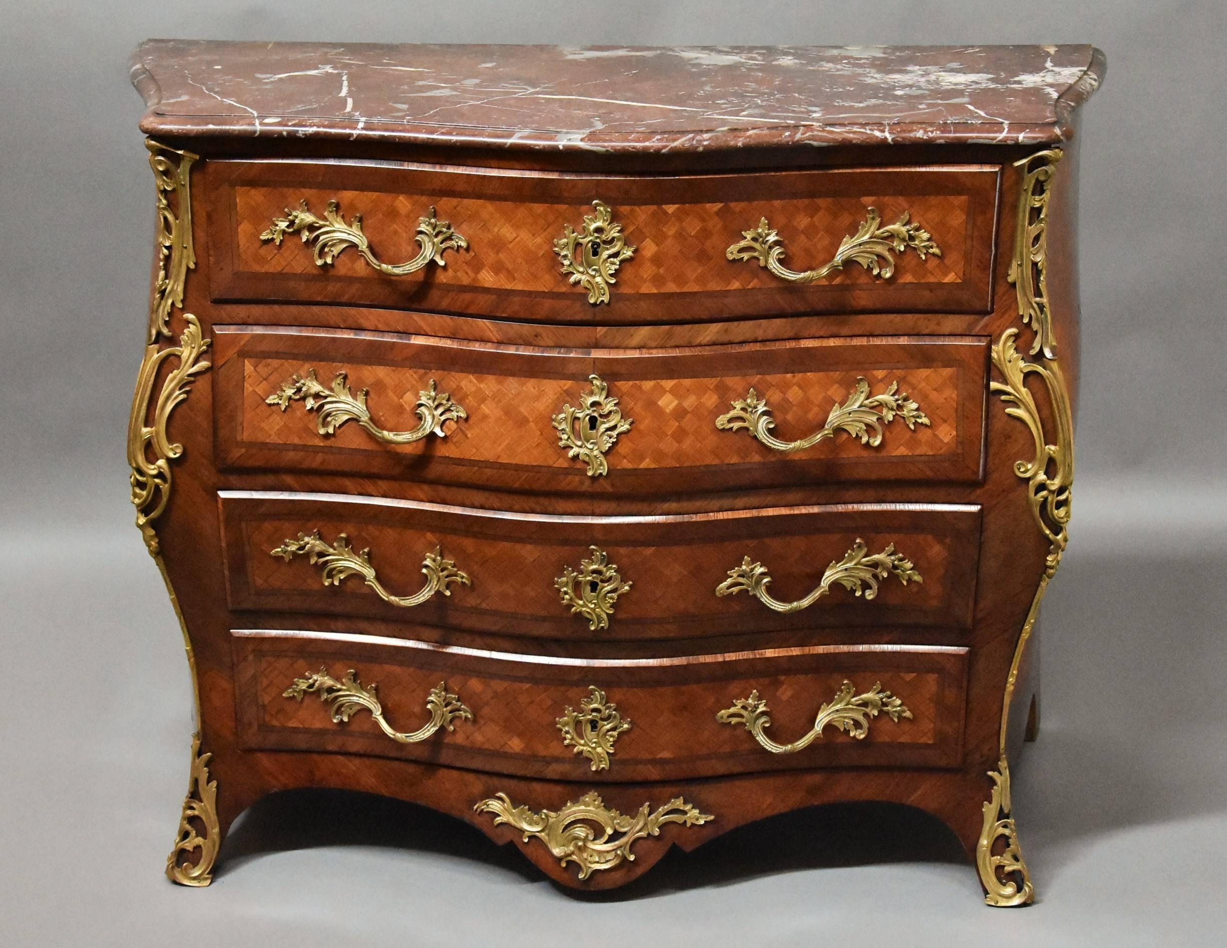 A 19th century French kingwood bombe serpentine commode with marble top.

This commode consists of a rouge marble-top in excellent condition of serpentine form to the front with shaped sides and a moulded edge.

This leads down to four