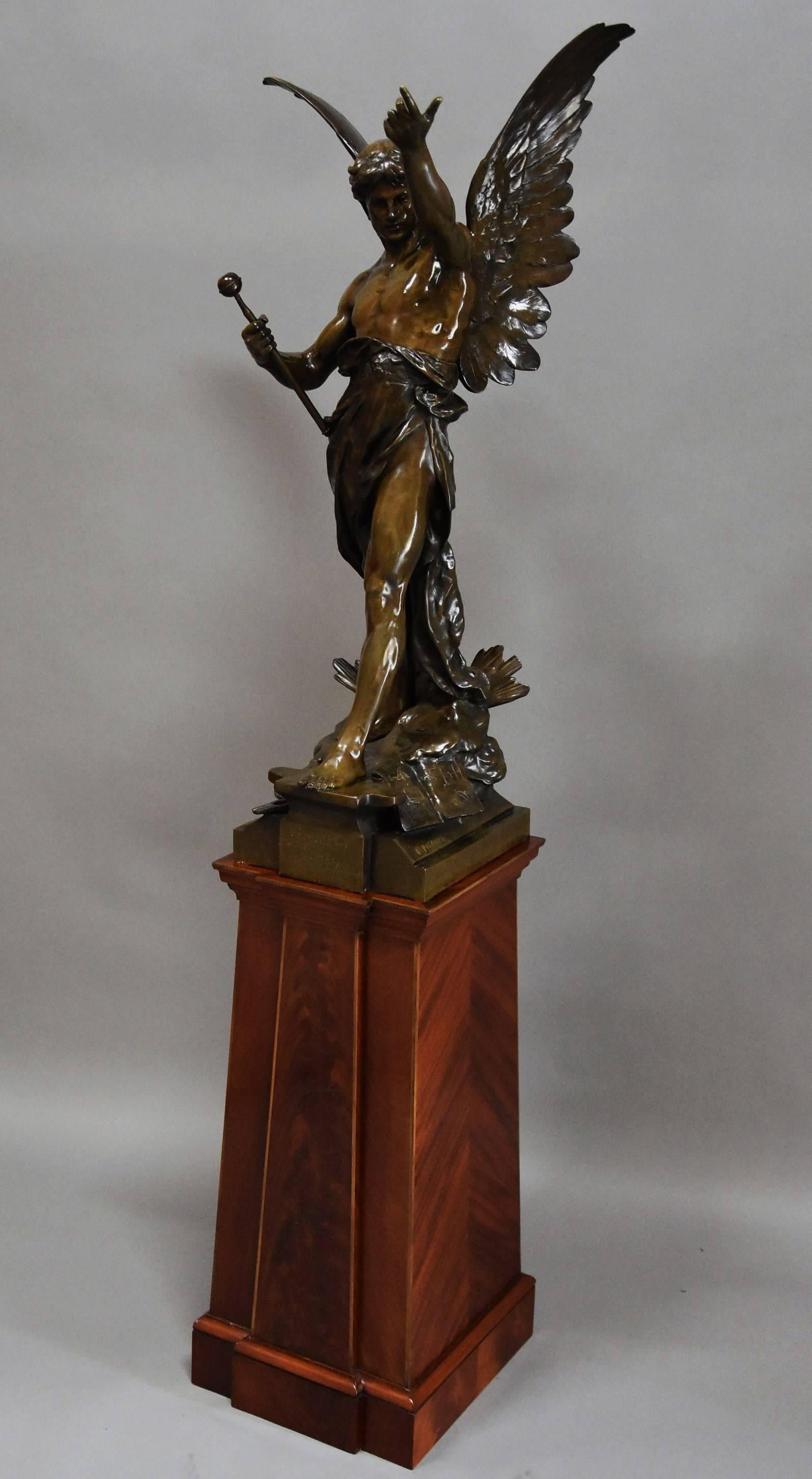 Superb quality large 19th century French bronze 'Le Genie du Travail' by Emile Picault (1833-1915) with fine patination supported on a mahogany pedestal.

This superb and imposing bronze 'Le Genie du Travail' translates as 'The Genius of