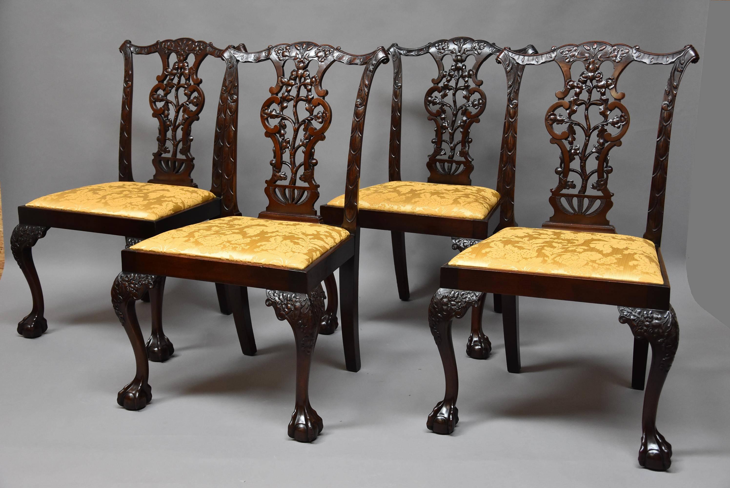 A superb quality late 19th century set of eight Chippendale style mahogany dining chairs by Charles Baker of Bath.

This set of dining chairs consist of finely carved mahogany backs with a shaped top rail carved with scrolling foliate designs with