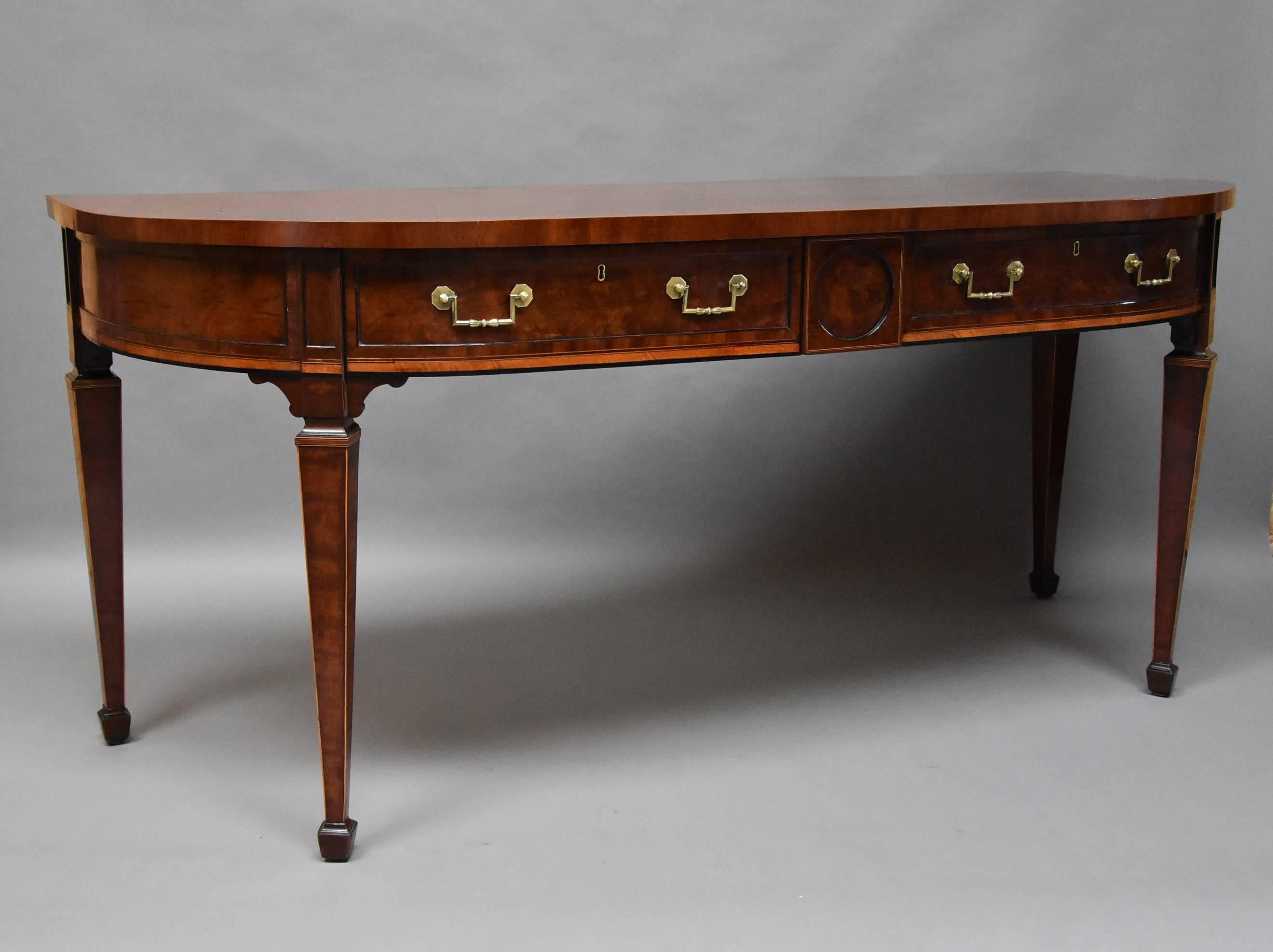 An extremely rare and fine quality late 18th century Sheraton period mahogany side server or side table of bow form and of superb patina (color).

This superb side server consists of a superbly figured mahogany veneered top with mahogany