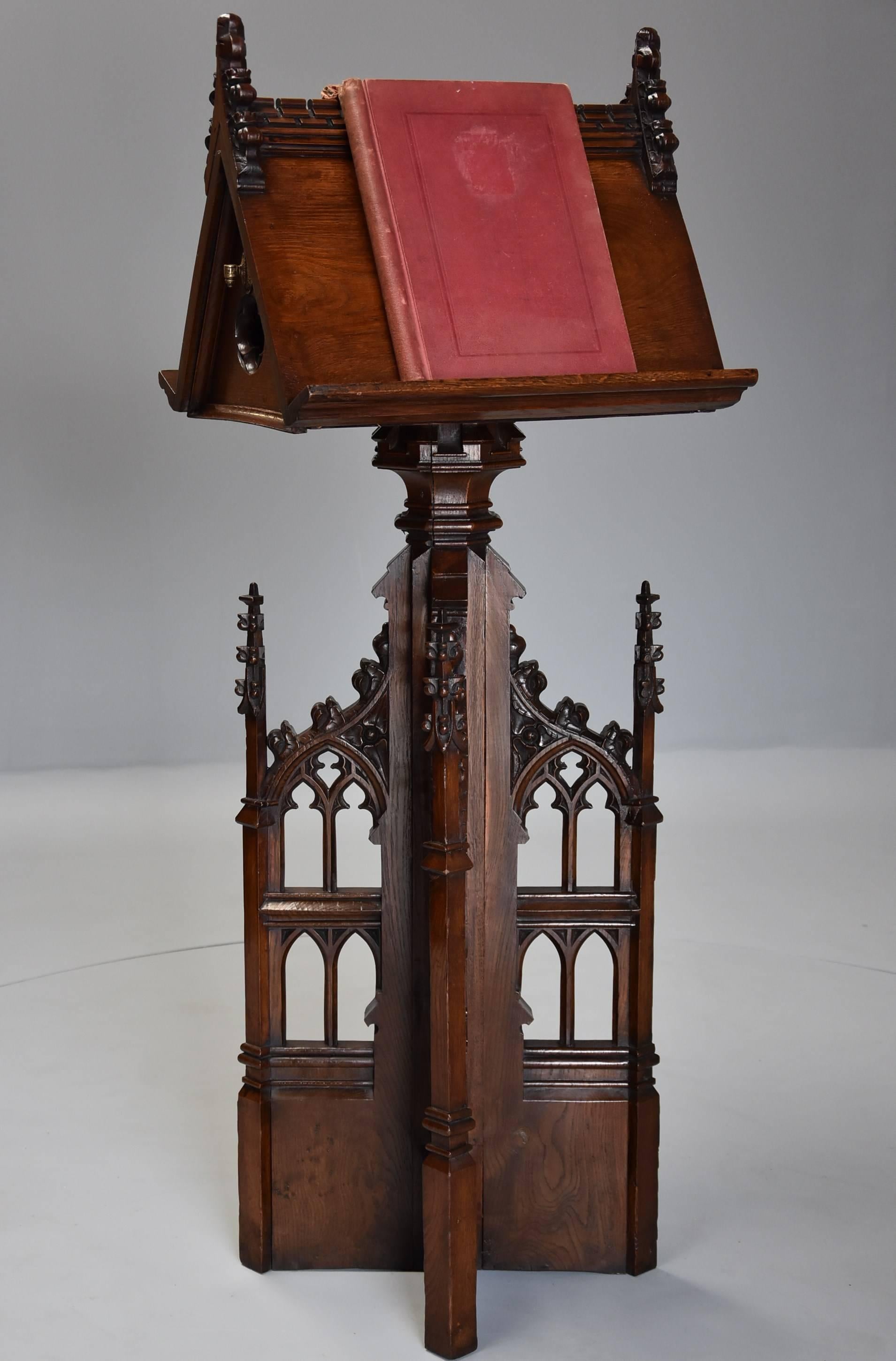 A late 19th century oak Gothic Revival revolving lectern.

The lectern consists of a revolving top with double book rest with dental moulding to the top and carved arched finials to either end with pierced quatrefoil decoration to the sides, the