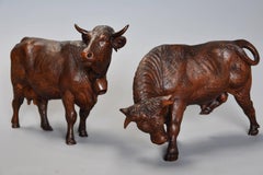 Pair of 19th Century Finely Carved Linden Wood Black Forest Cows, by Huggler