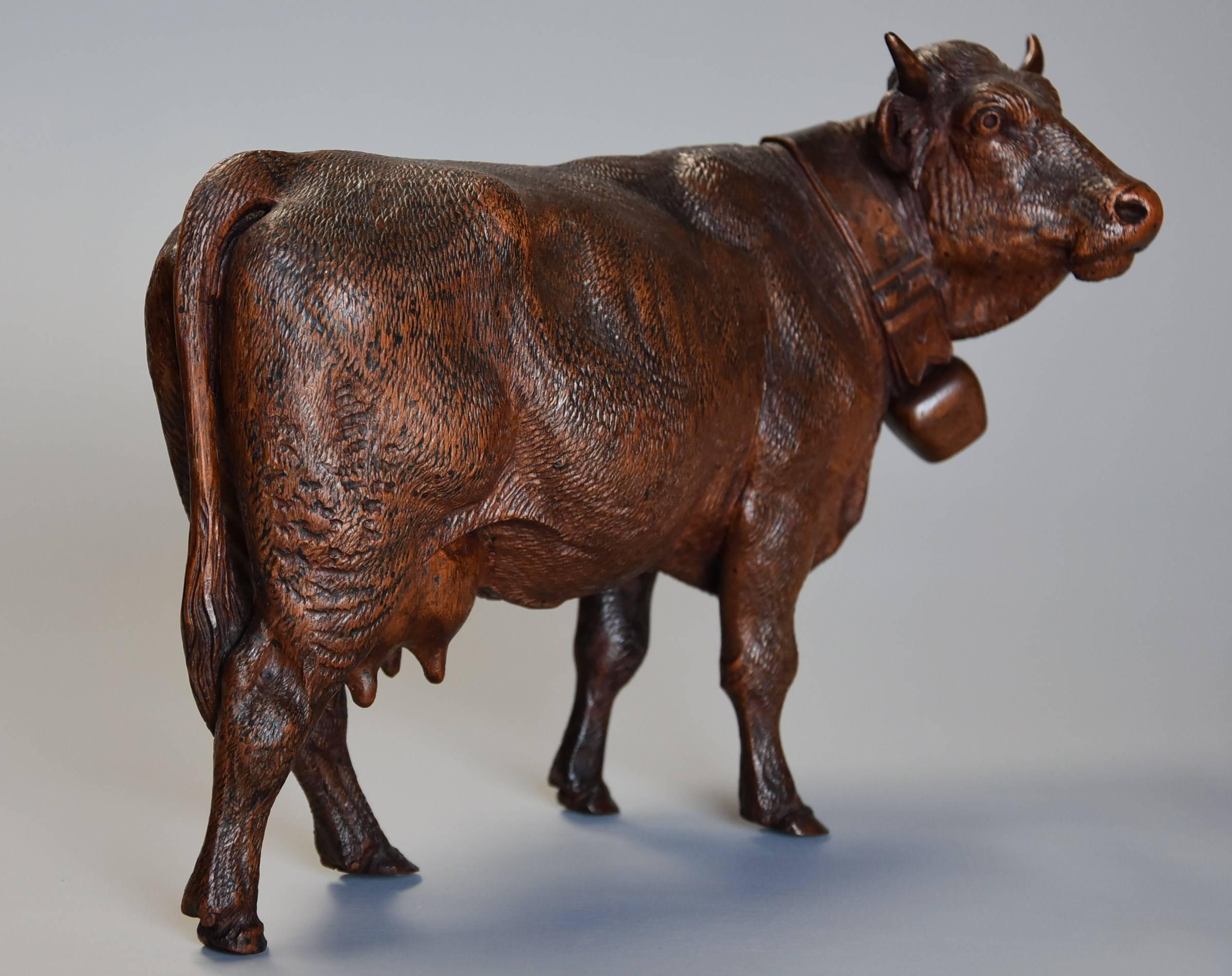 Pair of 19th Century Finely Carved Linden Wood Black Forest Cows, by Huggler For Sale 1