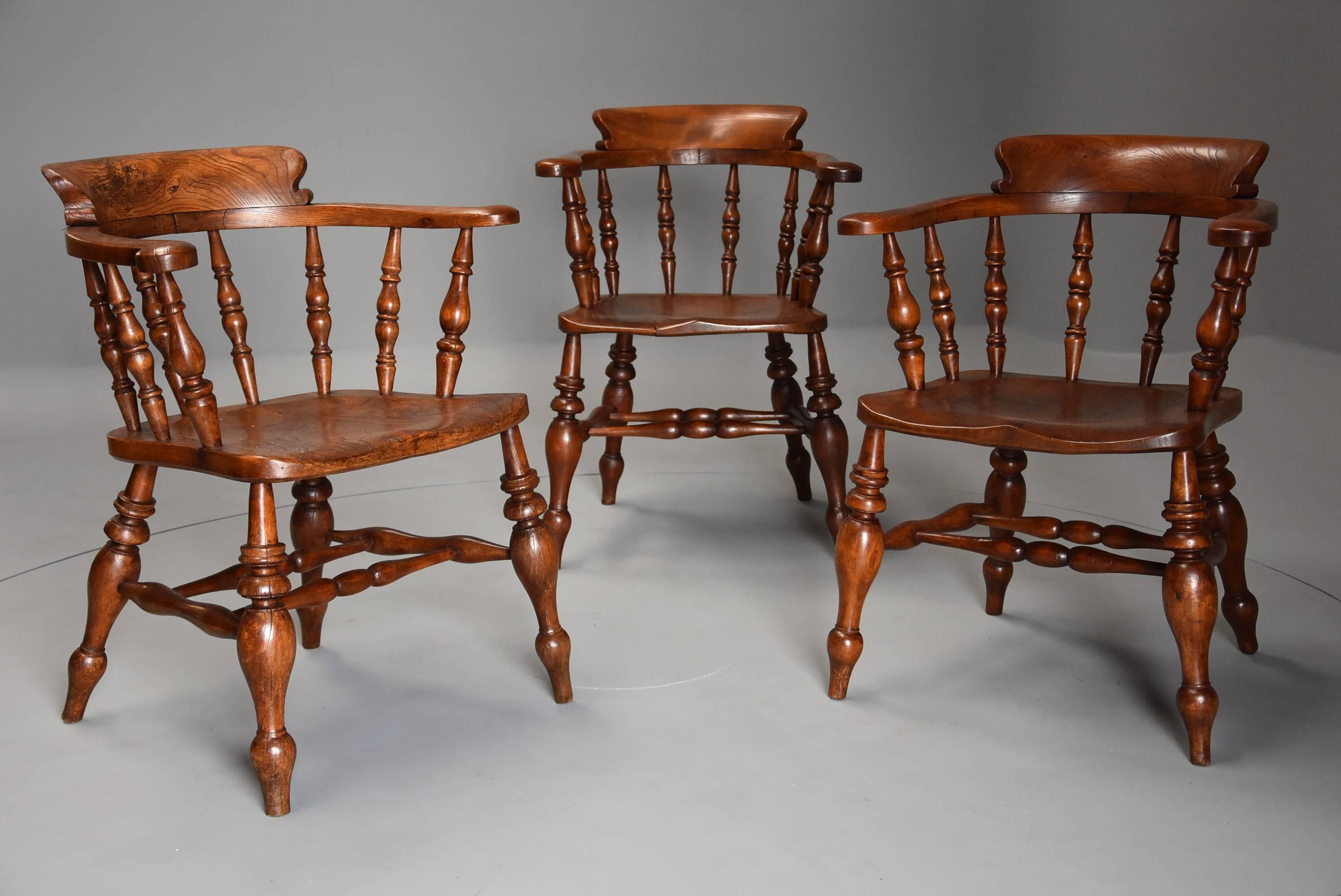 English Set of Six Mid-19th Century Nicely Figured Elm Smokers Bow Windsor Chairs