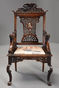 Exquisite and Rare French 19th Century Japanese Style Carved Walnut Armchair
