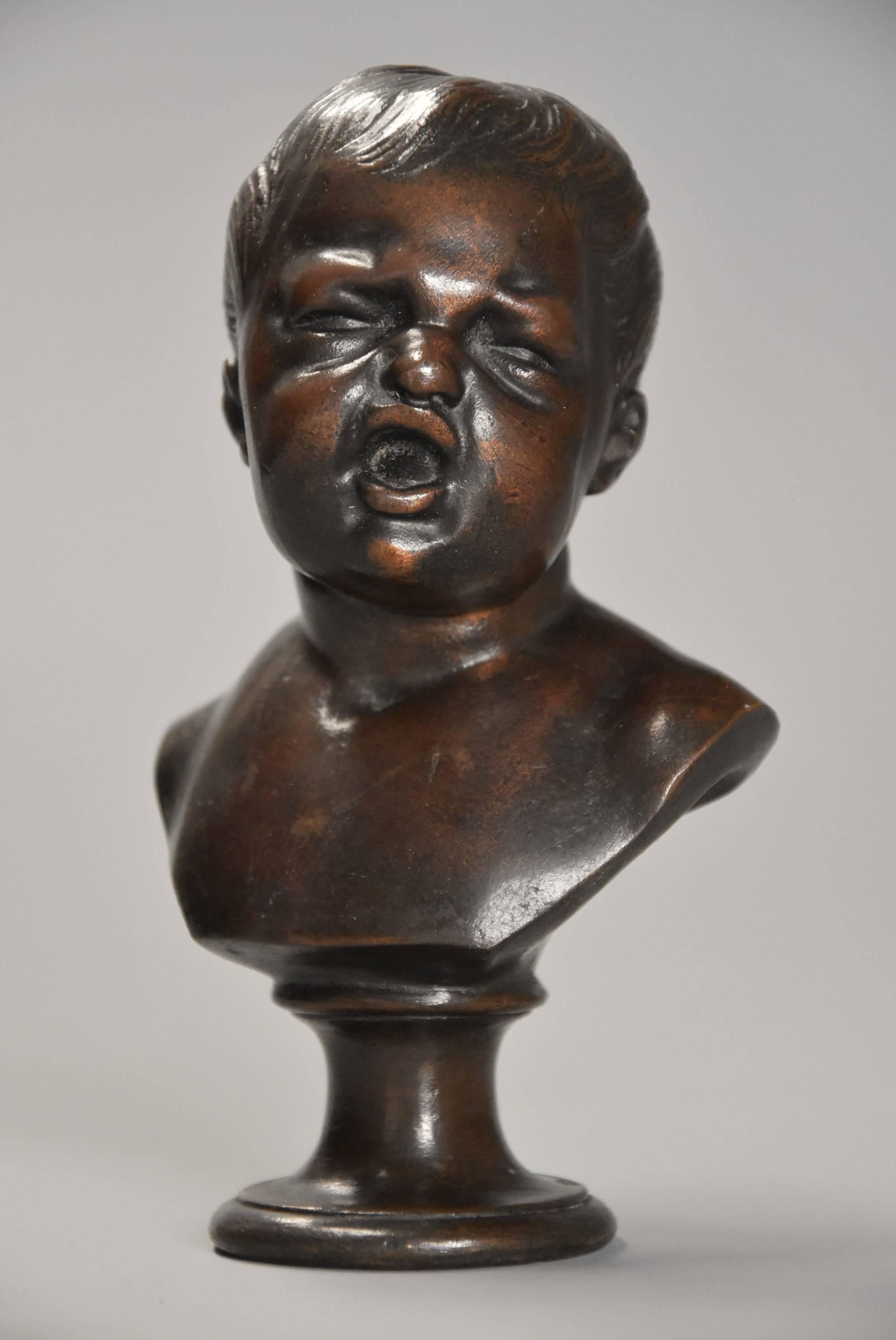 A charming fine quality late 19th century bronze bust of a young child of small proportions supported on integral moulded circular base, possibly Italian.

This bronze is in excellent condition for age and can go straight into a home.
