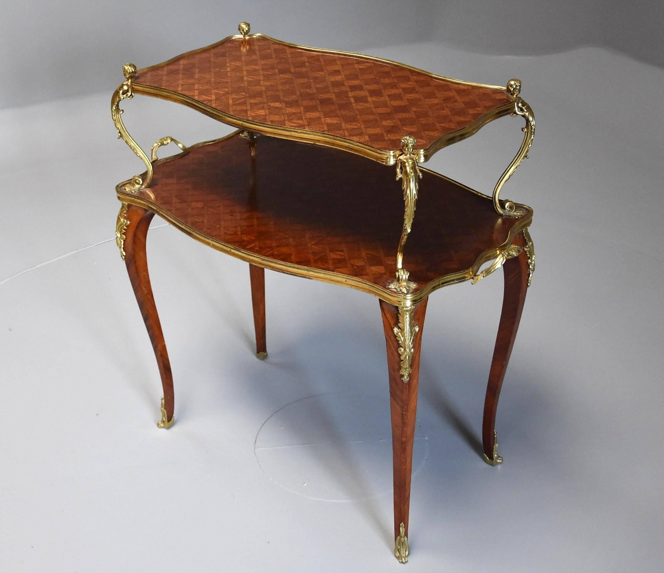 A fine quality French late 19th century kingwood two-tier freestanding serpentine shaped etagere with parquetry decoration. 

This highly decorative etagere has two tiers, the top tier having kingwood parquetry decoration with a gilt metal moulded
