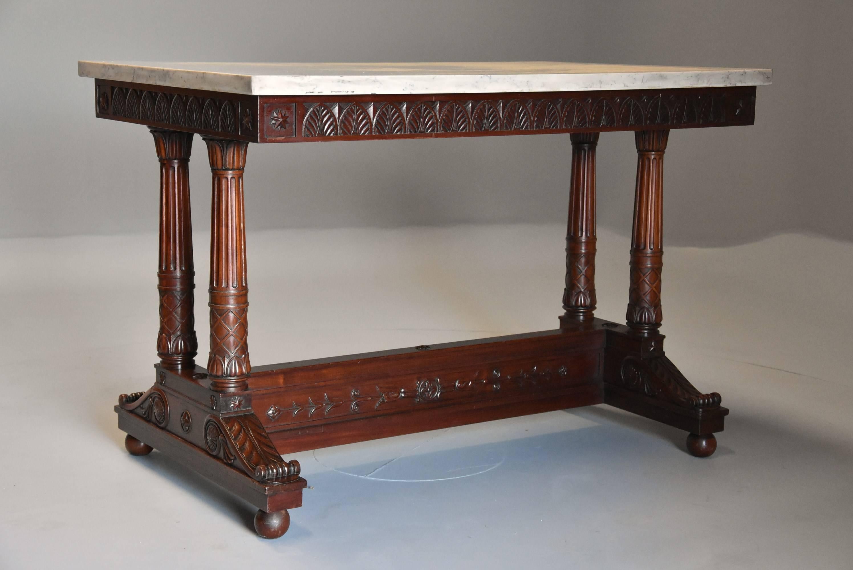 A rare and fine quality early 19th century (circa 1815) French Empire centre table with marble top with Egyptian influences of oblong form, stamped 'JACOB'.

This table consists of an off white marble top of oblong form supported on a mahogany