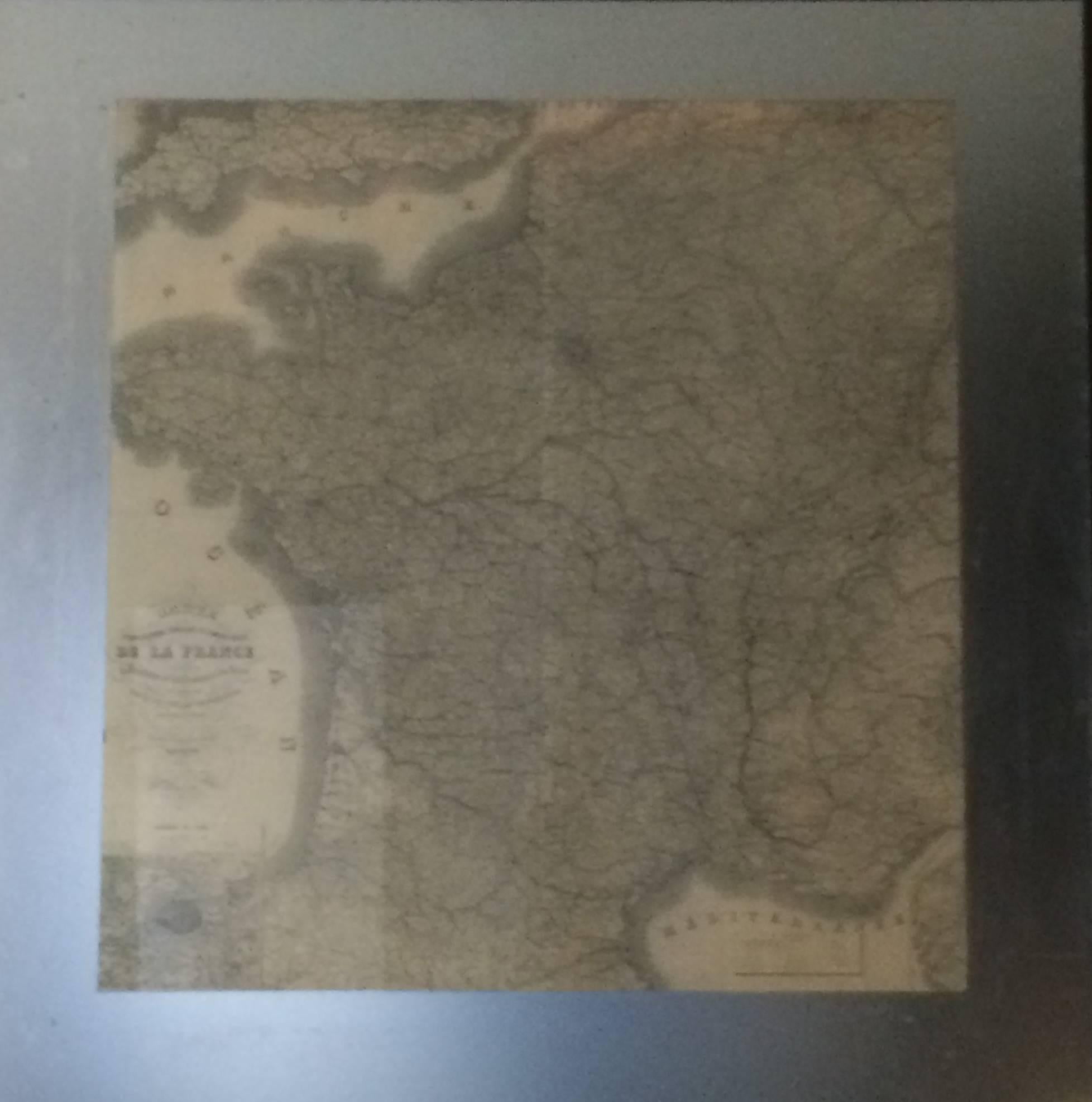 Map of France with brushed metal frame. This masterful piece was in the mansion of Madeleine Vionnet, certainly in the grand salon created by Adolphe Chanaux.