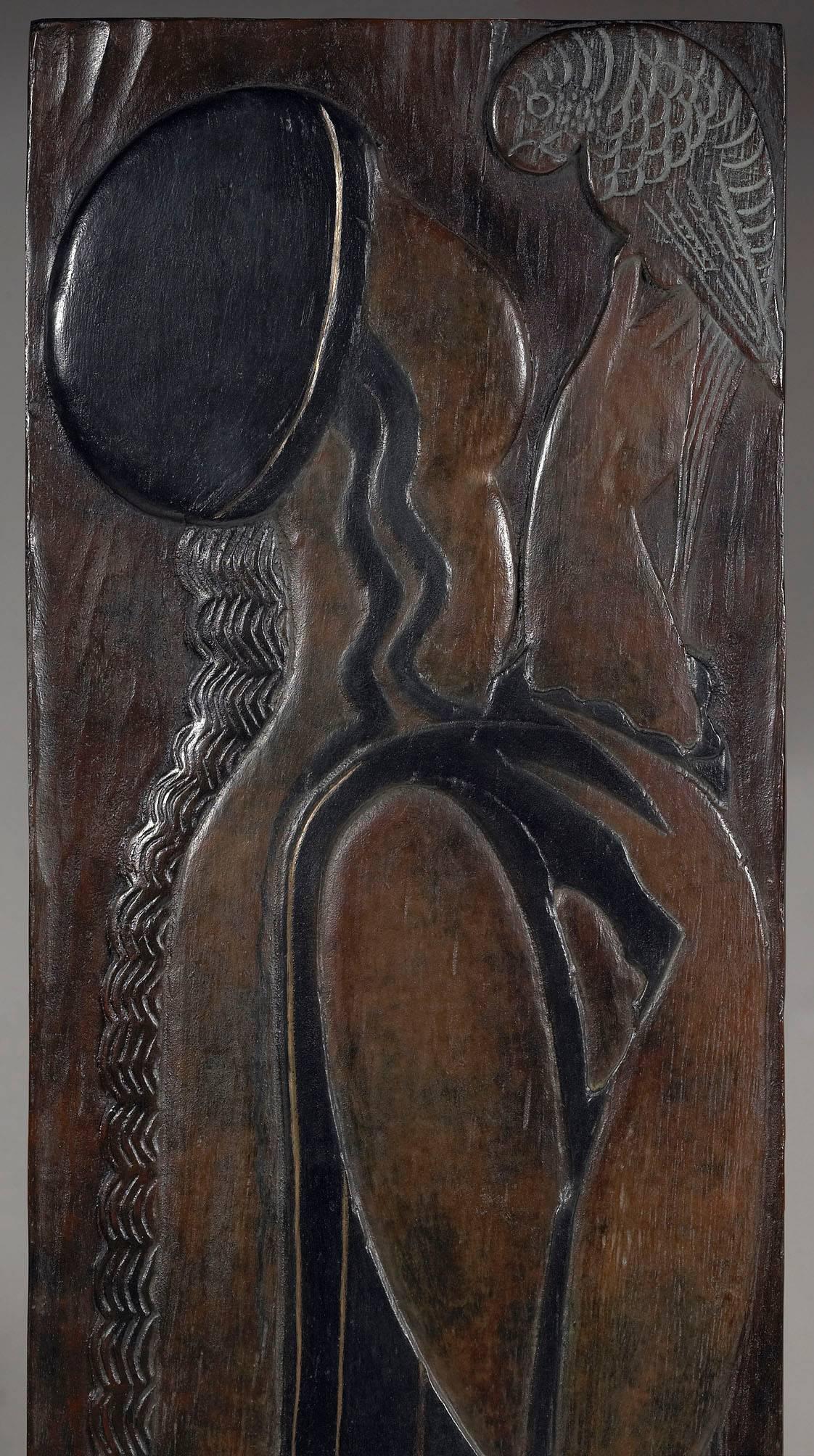 Brown patinated bronze panel enhanced with black and slightly polychromed, representing a woman dressed in the antique style, holding a parrot.
Signed, Deroyaume foundry, JDV stamp, cast n° 6/8, realized from the original wood.
Limited edition of