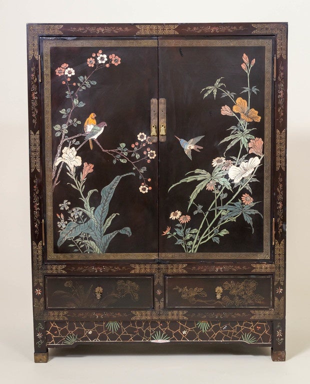 Chinese coromandel and lacquer cabinet, Shanghai, China. Fully decorated on the top, three sides and aprons. Bearing a metal label marked Shanghai, China on the middle of the front apron.
Well secured back.
Recessed birds, flowers and foliage