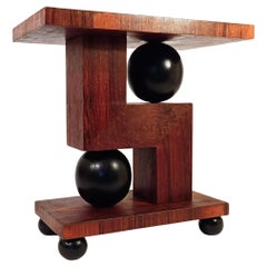 Art Deco. Walnut sculptural cubist style side table, Italy, 1930s