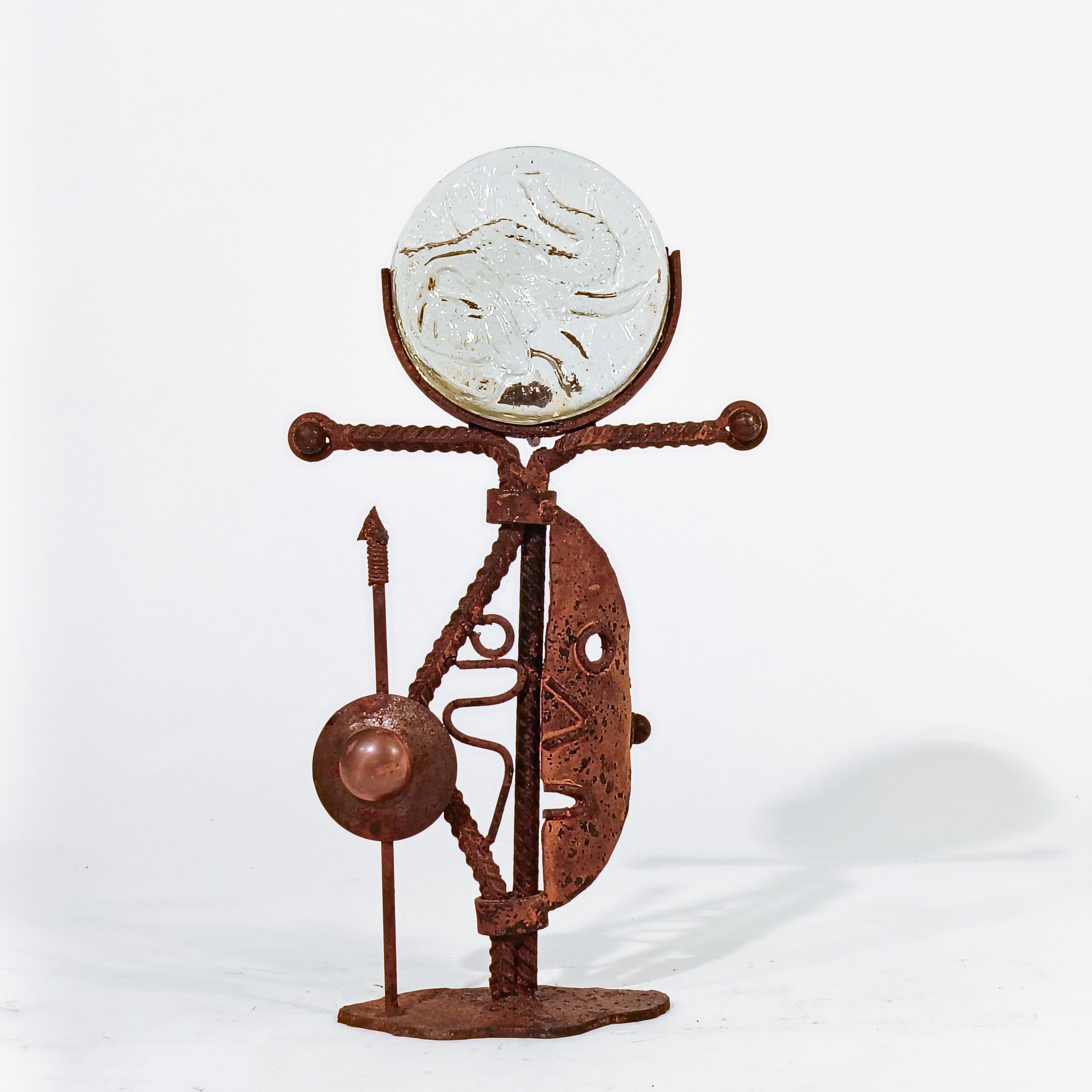 Ethnic and tribal style chandelier, Denmark, 70s. Hand-crafted andlestick or candle holder with aged wrought iron and copper, and with a top diffuser in solid molded glass with an elephant motif. Abstract figurative style and brutalist. Very much in