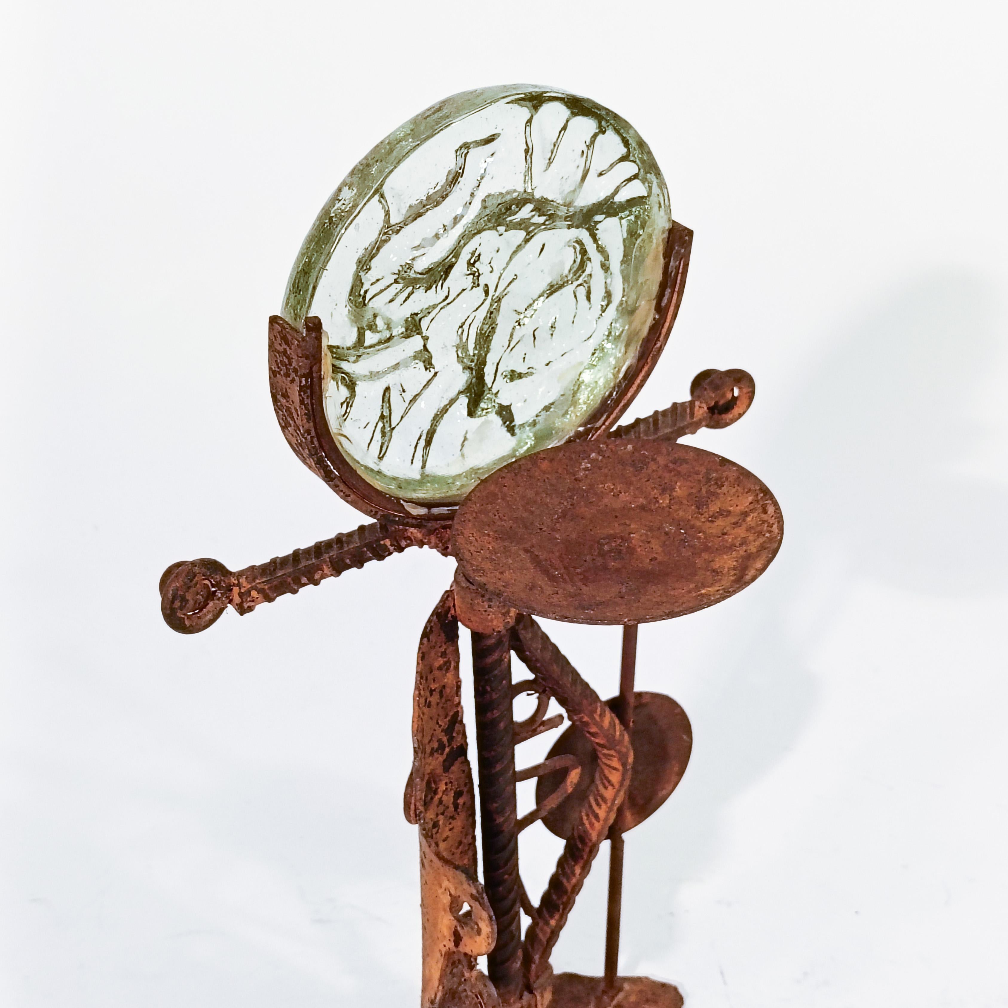 Fired Brutalist style. Hand made ethnic candlestick in iron, Denmark, 70s For Sale