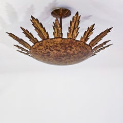 Lámpara empotrada grande de hierro forjado estilo Tudor Revival con diseño «Sunburst», de Ferro Art, España, década de 1950