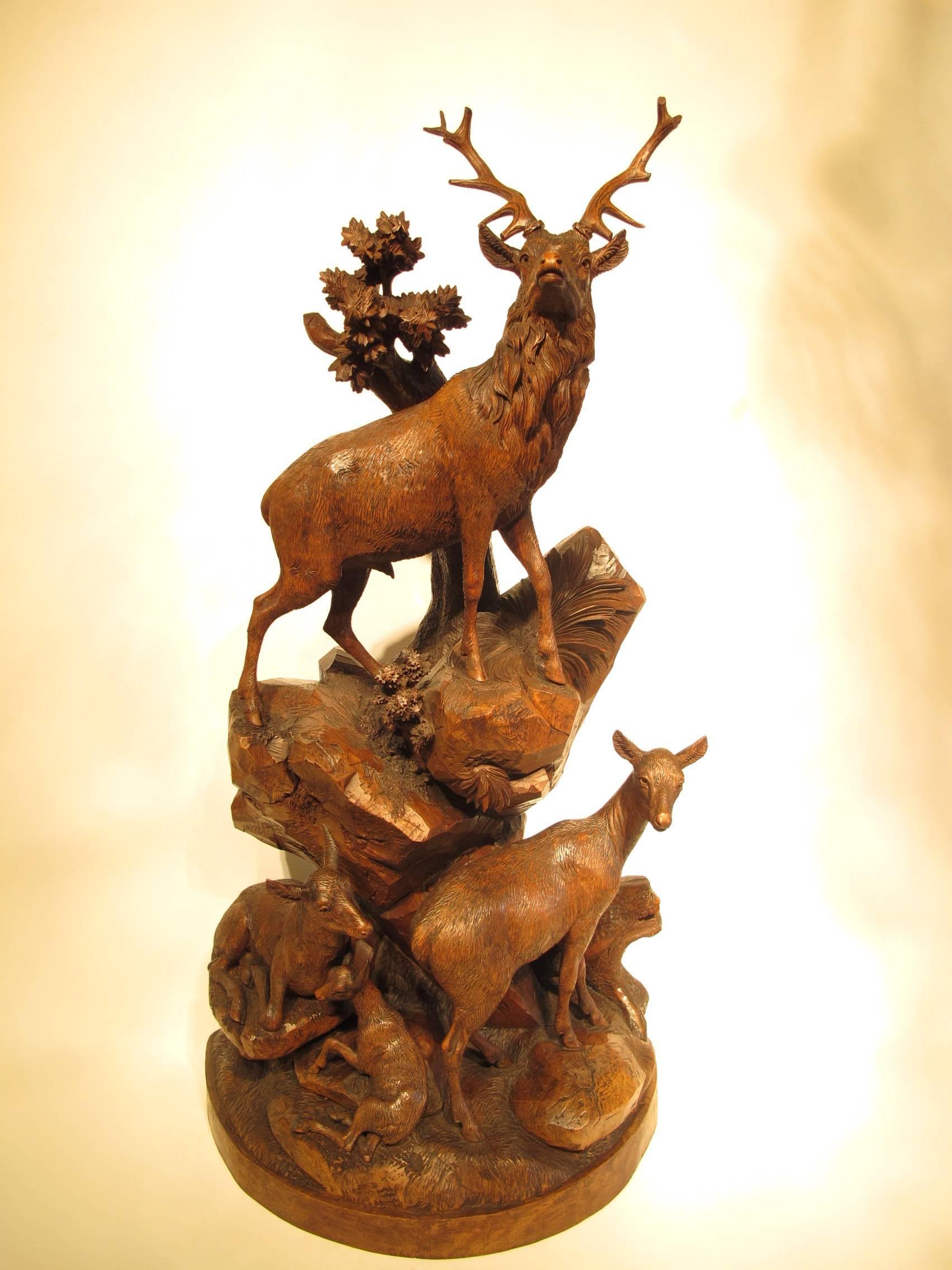 Large 19th century Swiss walnut black forest carved group of deer by Emile Egger.
Interlaken, circa 1880.

The best I've ever seen!

Dimensions:

H 73 cm x W 38 cm X D 20.5 cm.
H 28.74 in x W 14.96 in x D 8.07 in.
          