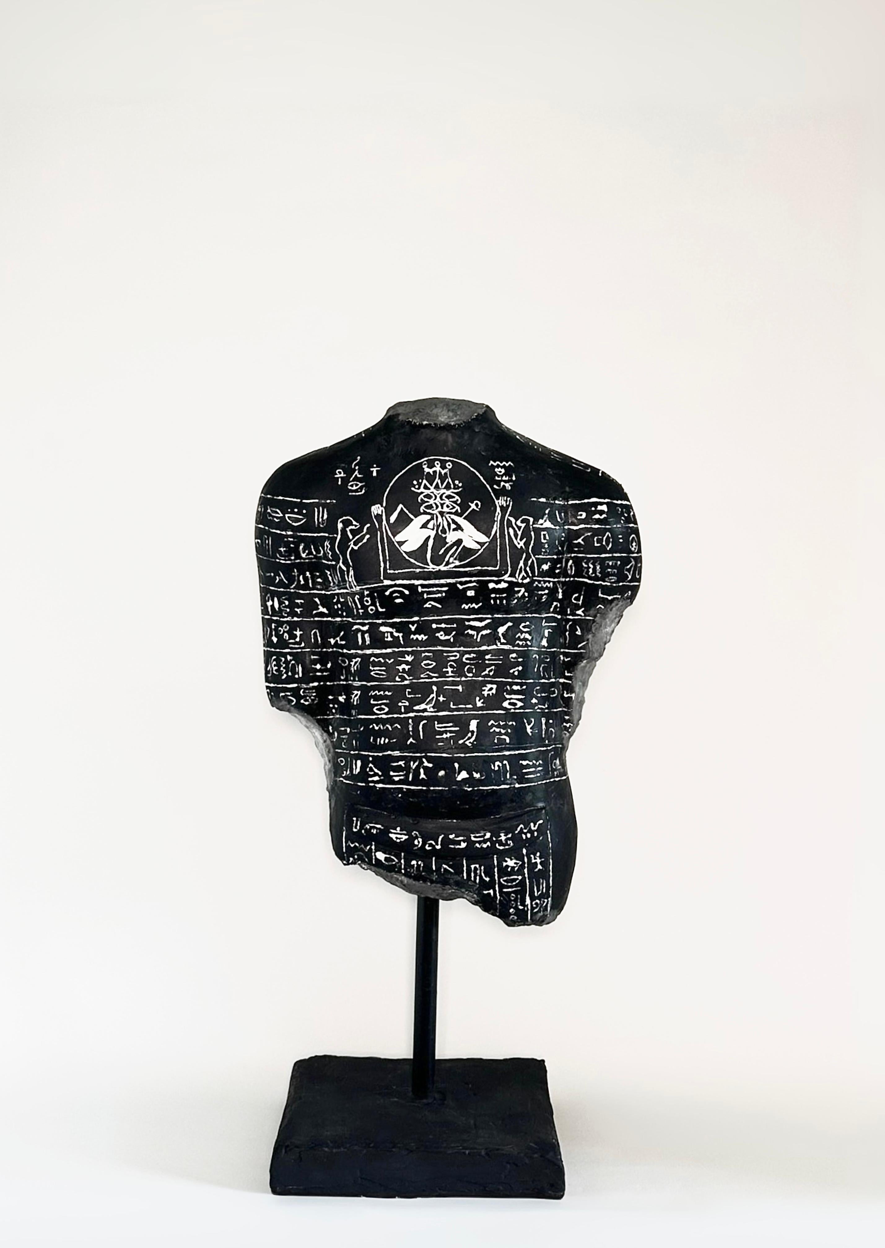 This Egyptian sculptural torso, depicts the coronation of young Ramses II, capturing the transformative moment when a teenage boy became a living god. Carved with protective magic spells, its inscriptions guarded him from disease, shielded his