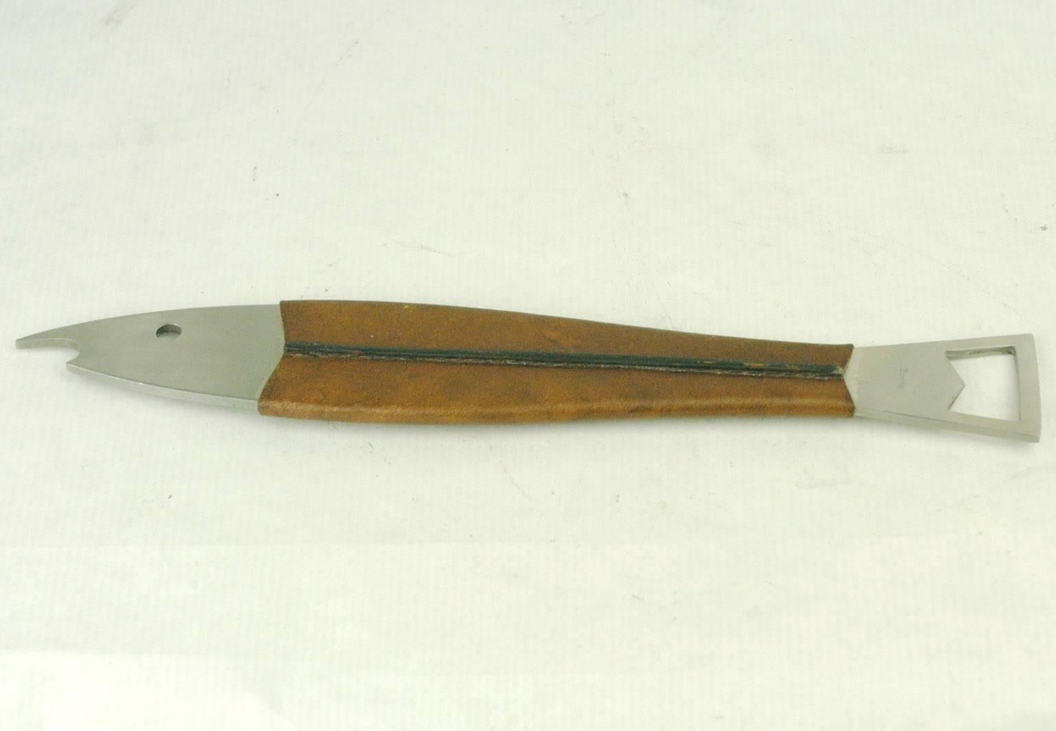 Austrian Modernist bottle opener by Carl Auböck, version with brown leather.