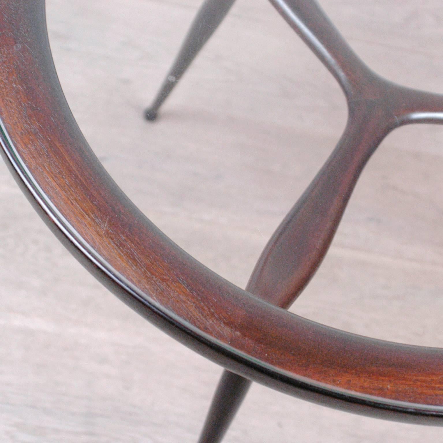 Extremely elegant Italian modern coffee or side table, mahogany with glass top.