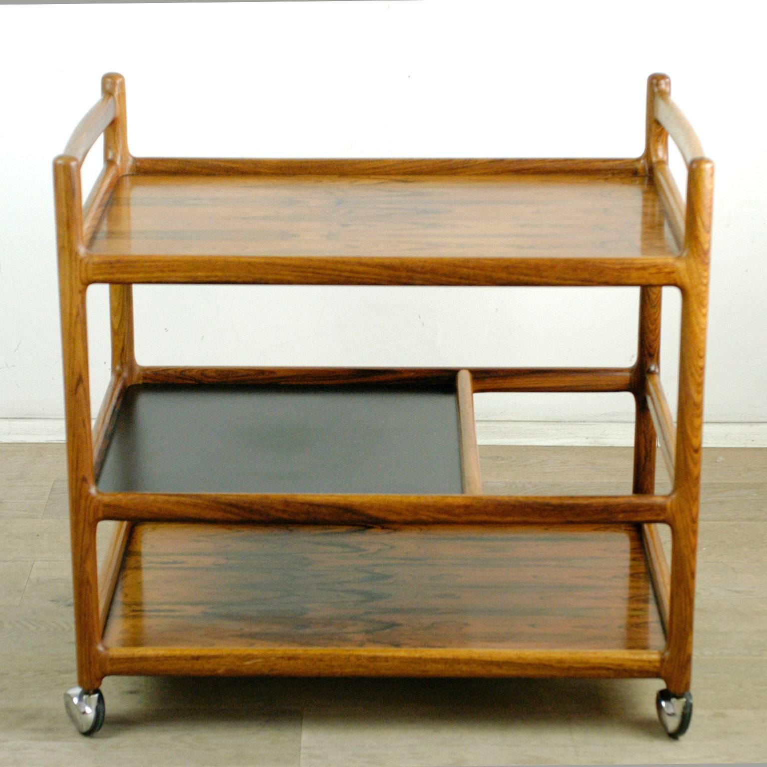 Solid rosewood Danish 1960s serving trolley.