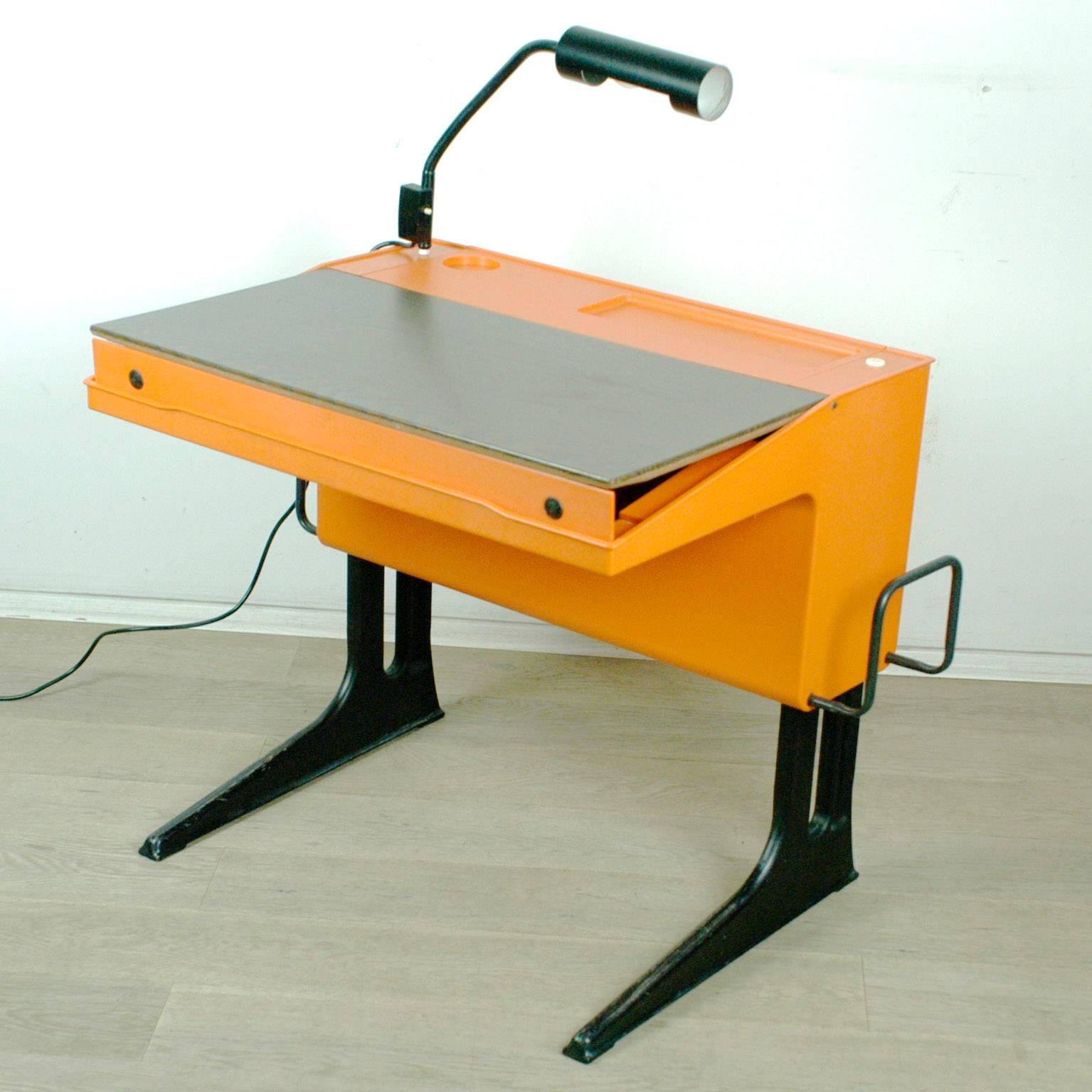Height adjustable desk with desk light.