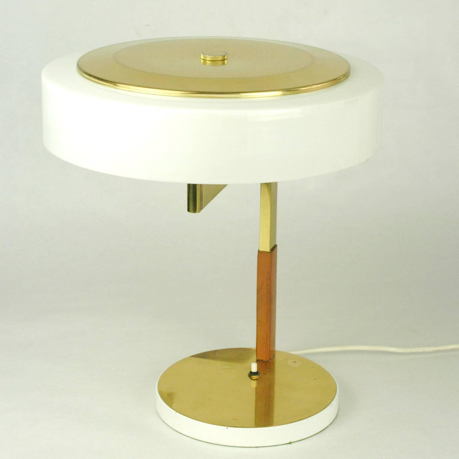 Excellent Austrian 1960s brass, leather and acrylic desk lamp with adjustable shade designed an manufactured by J.T. Kalmar Vienna.