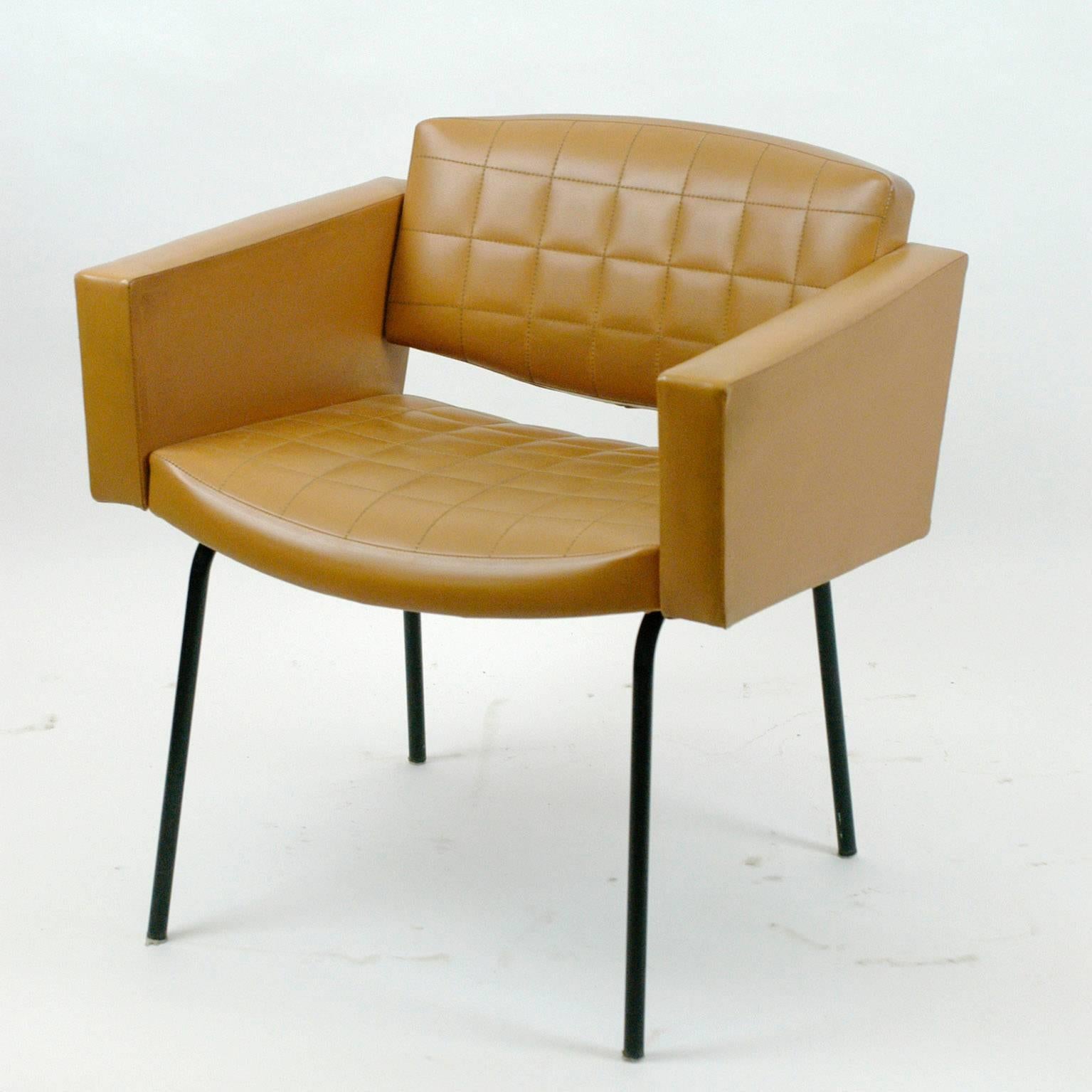 Mid-Century Modern armchair with original Skai upholstery and black laquered base, original Meurop tag on the underside.
Matching chairs available.