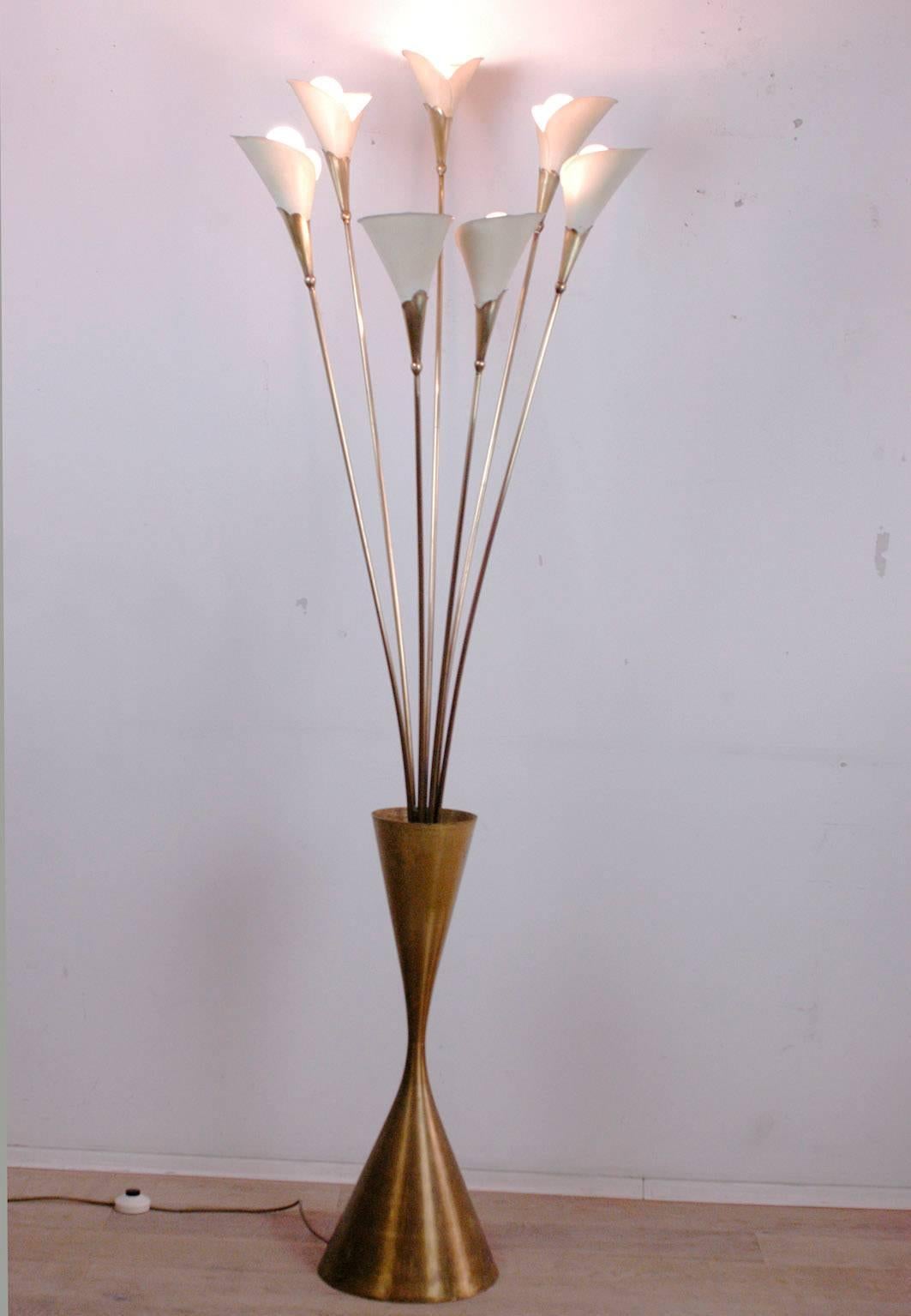 Seven stems with light sockets and shades shaped as the 