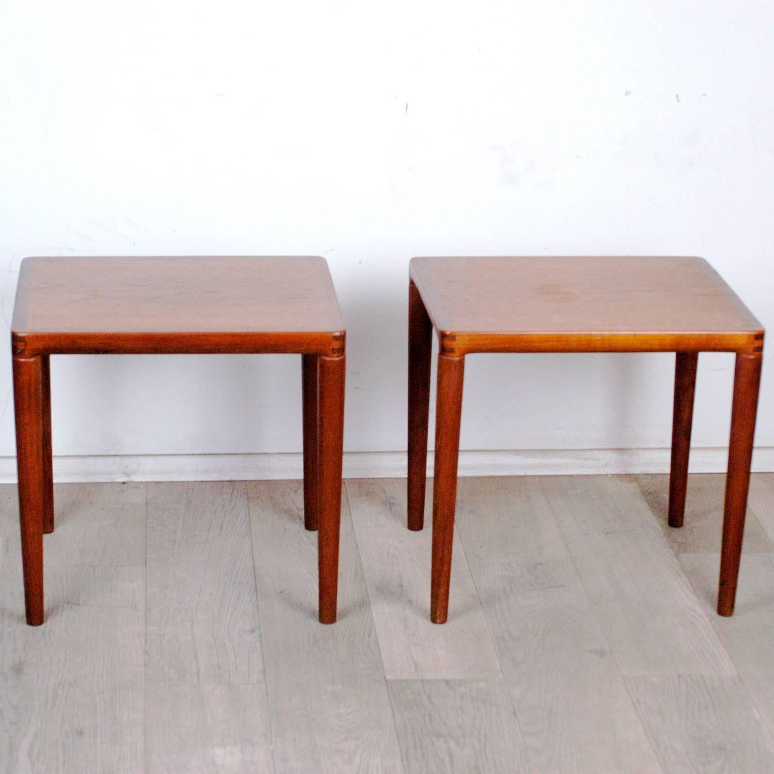 Pair of Scandinavian modern teak side tables with beautiful handcrafted details-
Marked "Made in Denmark” on the under side.