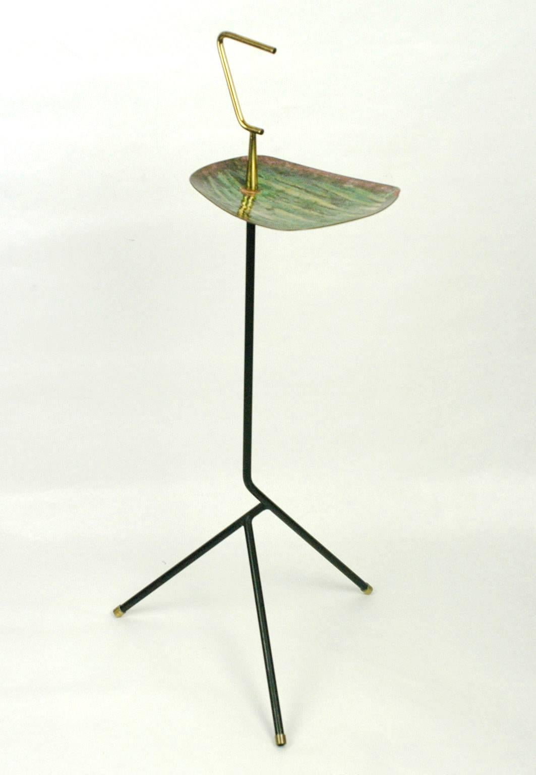 Elegant Italian 1950s tripod standing ashtray with enamelled tray and brass details.