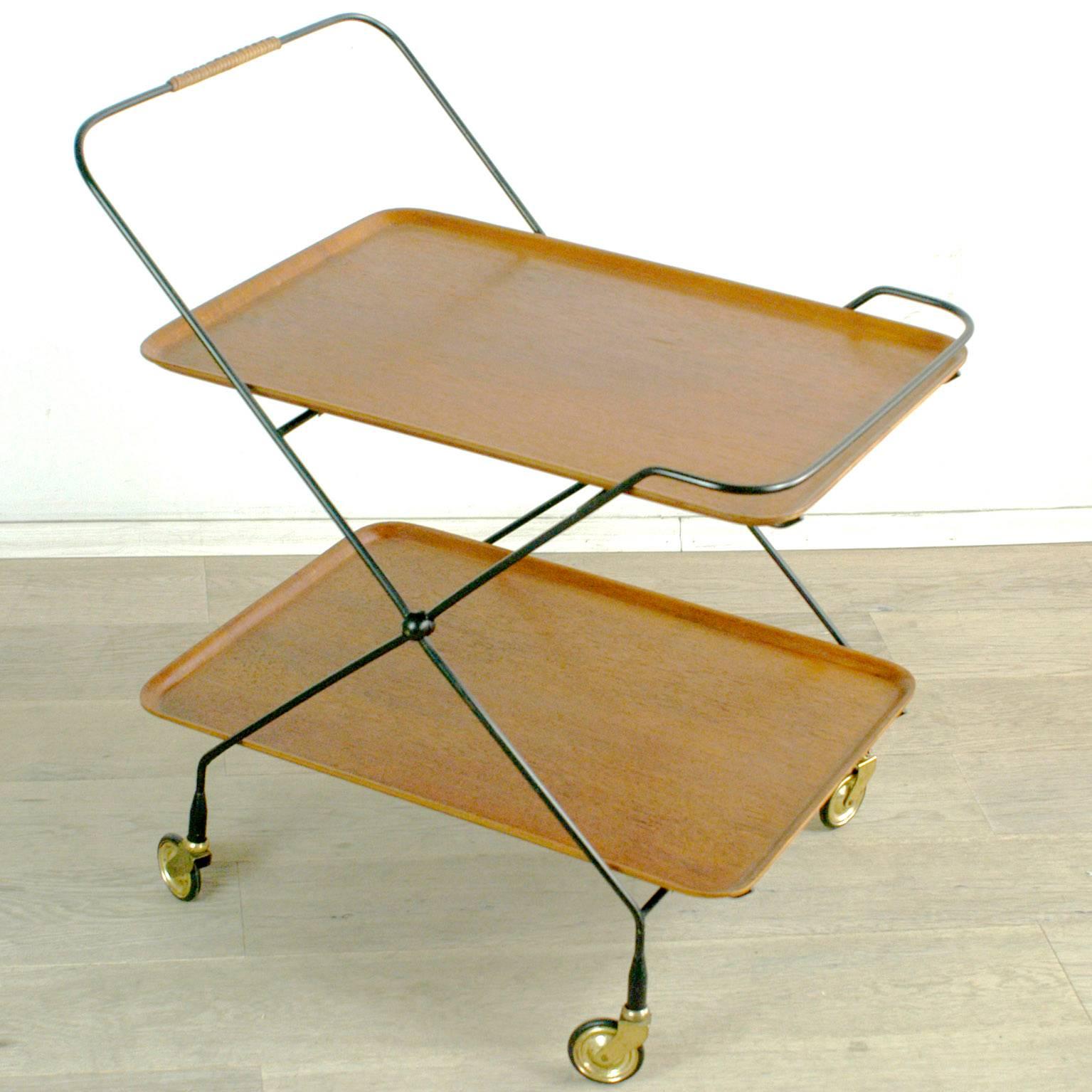 Charming Scandinavian serving tray with foldable metal and brass base and removable teak trays.