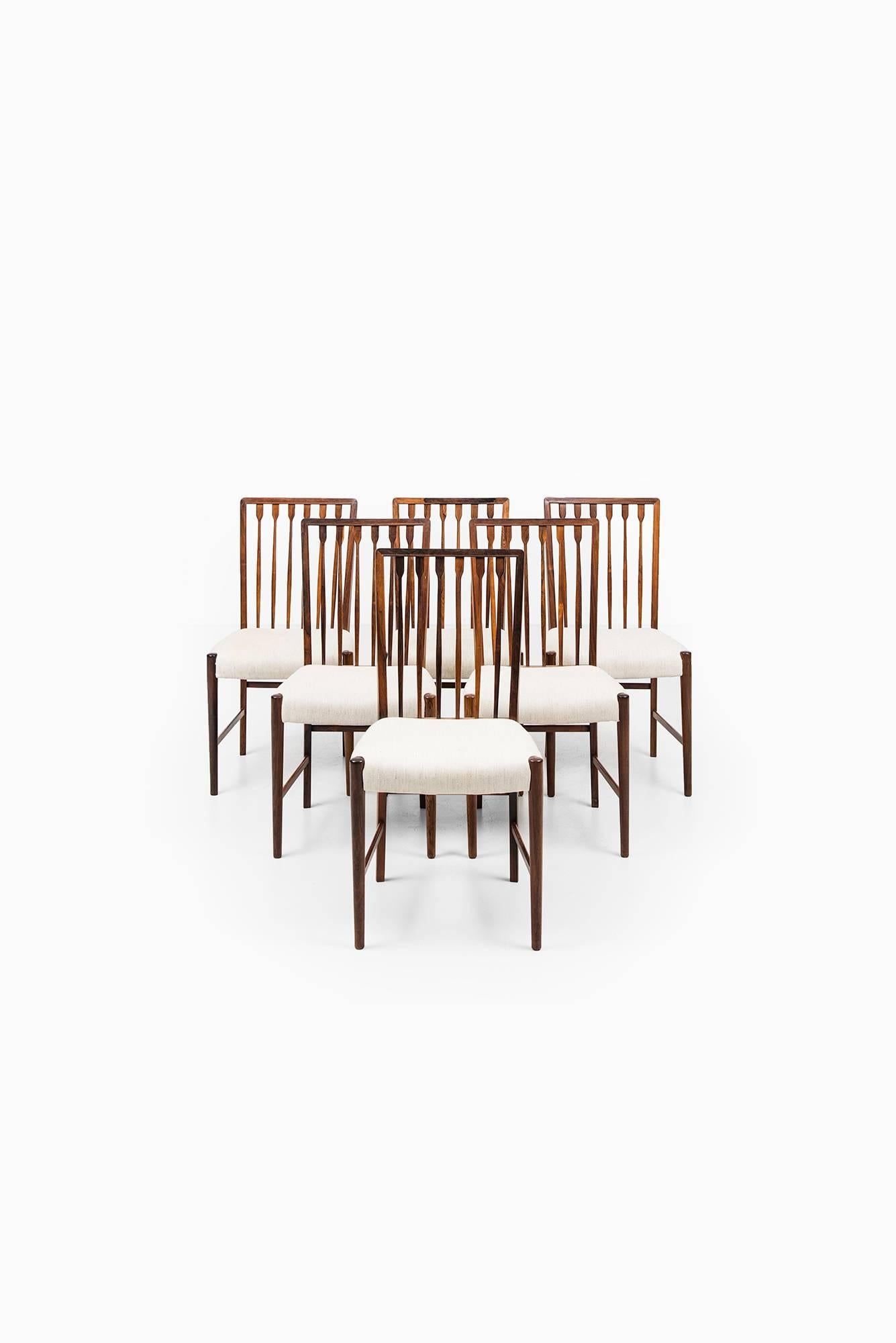 Very rare set of eight dining chairs designed in 1948 by Agner Christoffersen. Produced by N.C. Christoffersen in Copenhagen, Denmark. Matching dining table is also available.