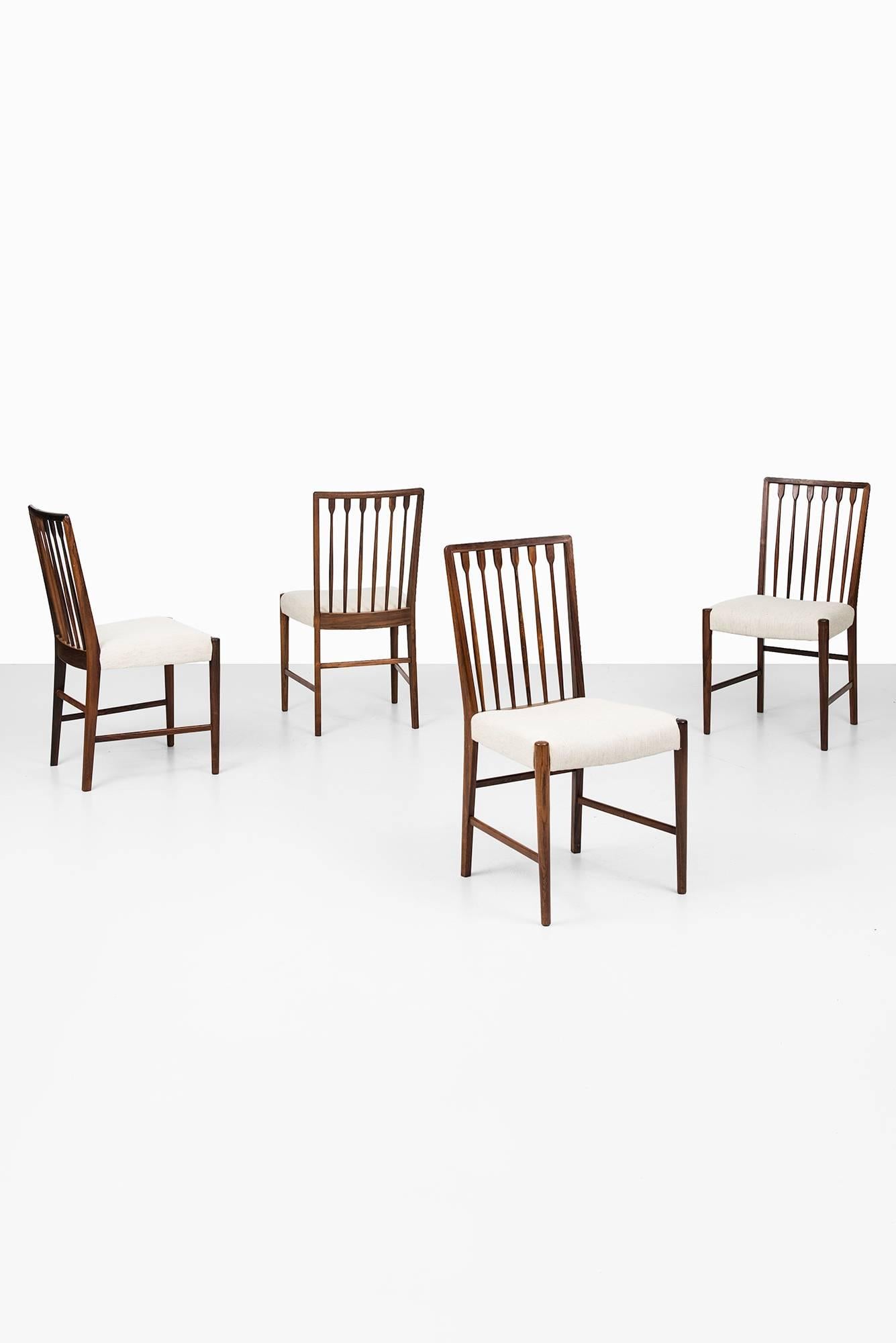 Fabric Rare Set of Eight Dining Chairs Designed by Agner Christoffersen in Denmark