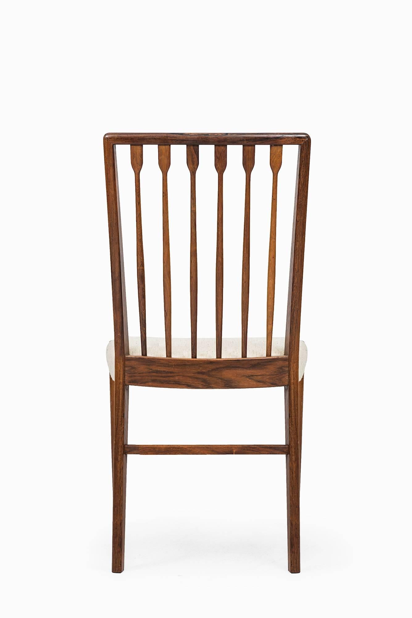 Mid-20th Century Rare Set of Eight Dining Chairs Designed by Agner Christoffersen in Denmark