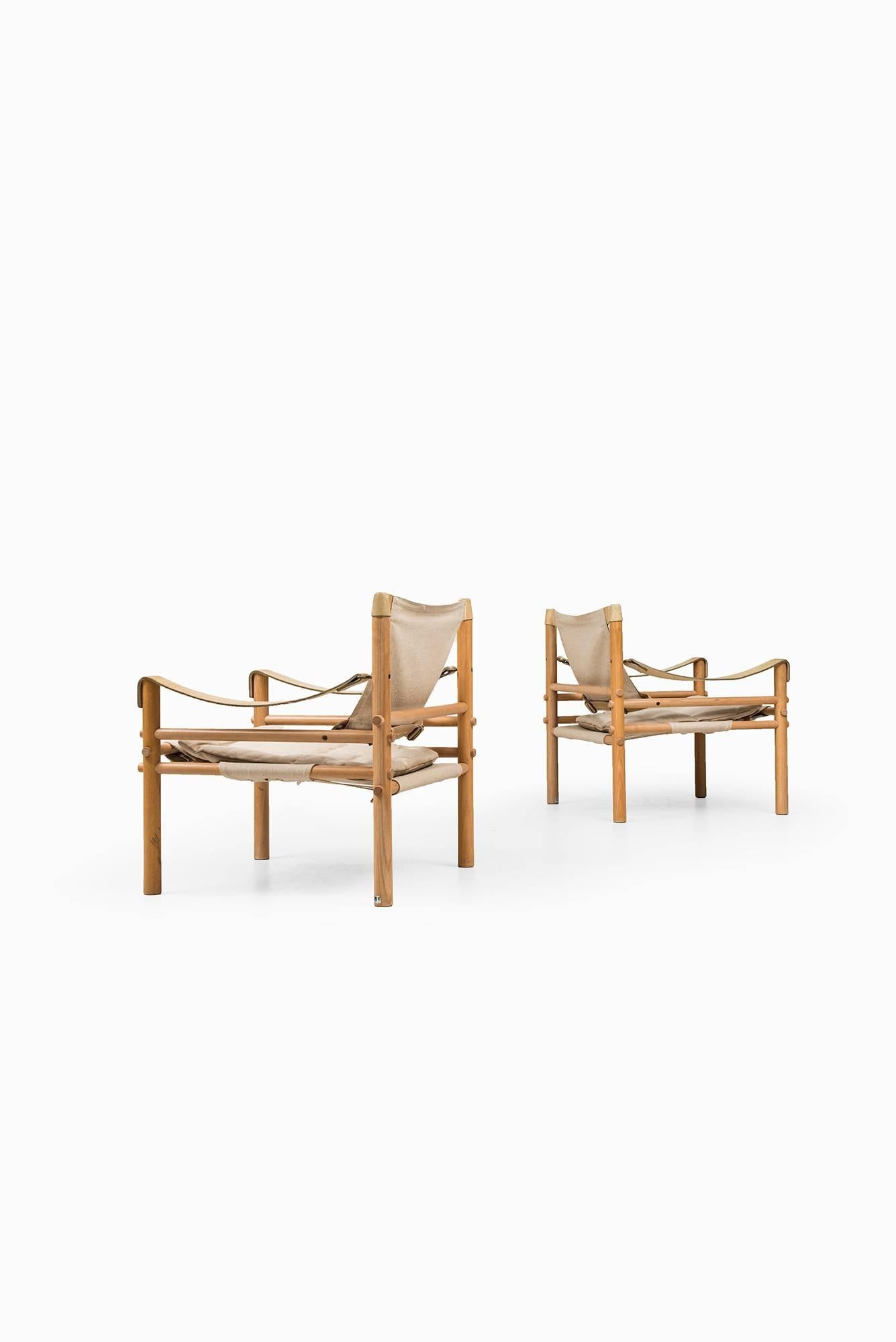 A pair of easy chair model Sirocco/Scirocco designed by Arne Norell. Produced by Arne Norell AB in Aneby, Sweden.