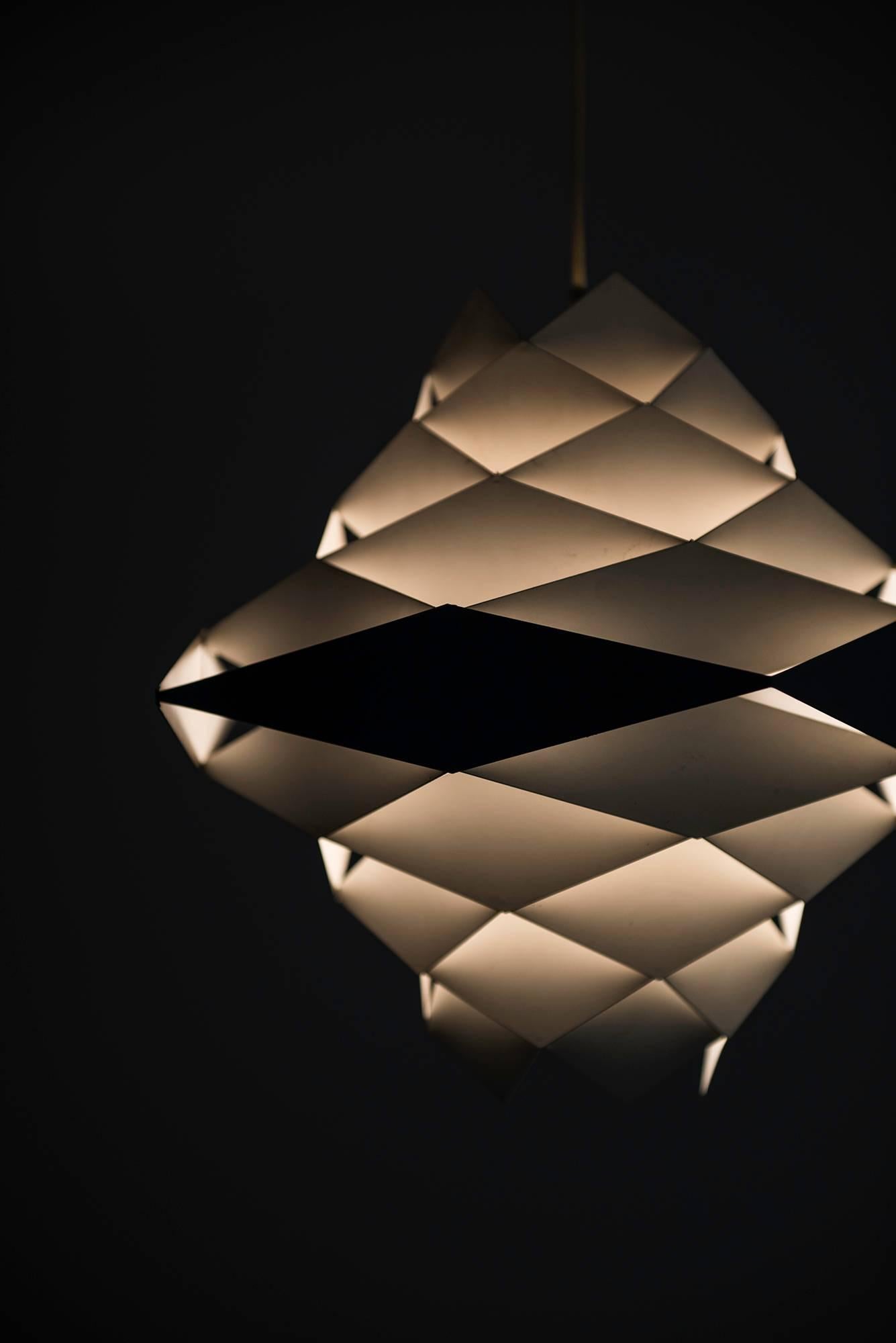 Ceiling lamp model Symfoni designed by Preben Dahl. Produced by Hans Følsgaard A/S in Denmark.