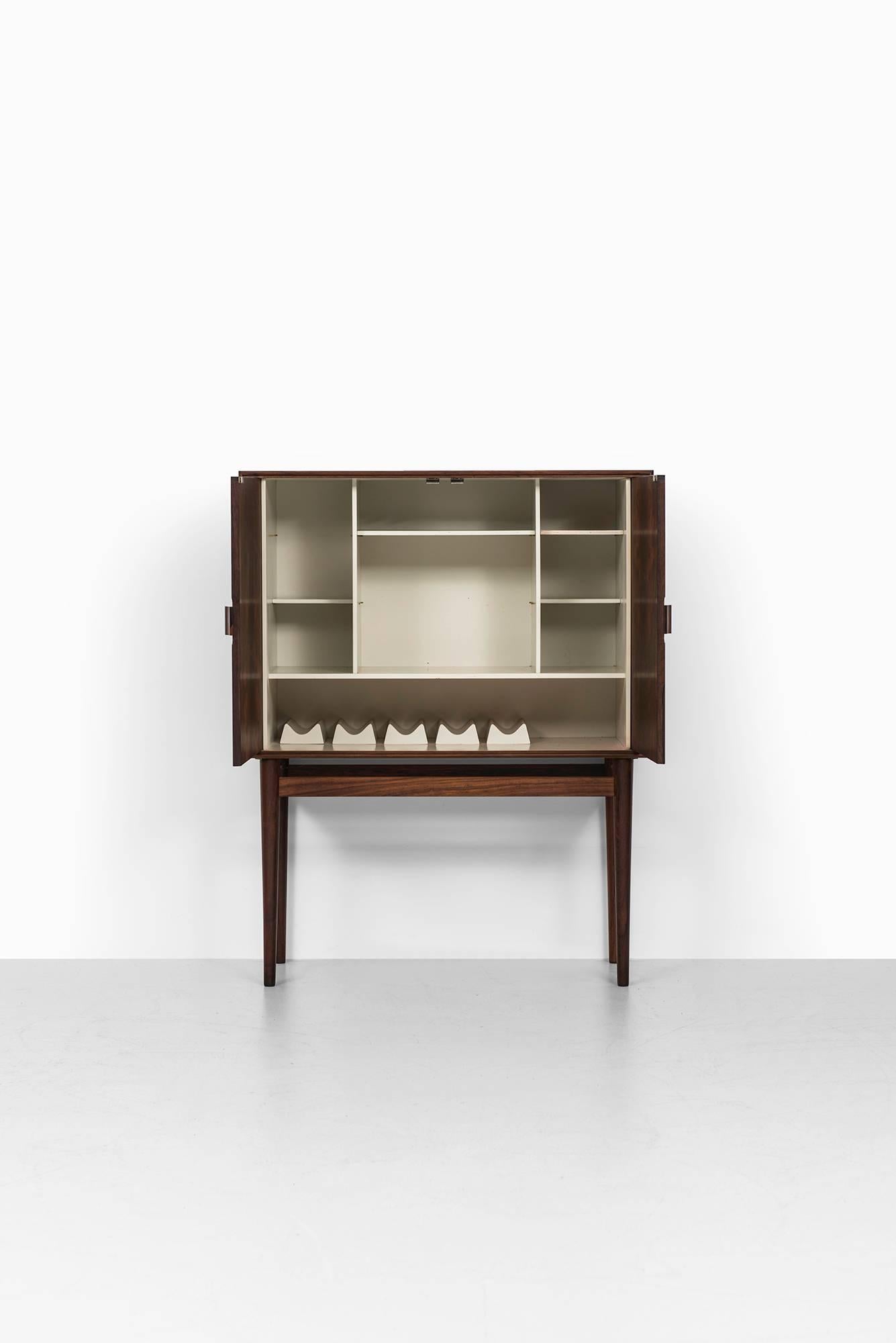 Rare bar cabinet model 63 designed by Helge Vestergaard Jensen. Produced by Jason Møbler in Denmark.