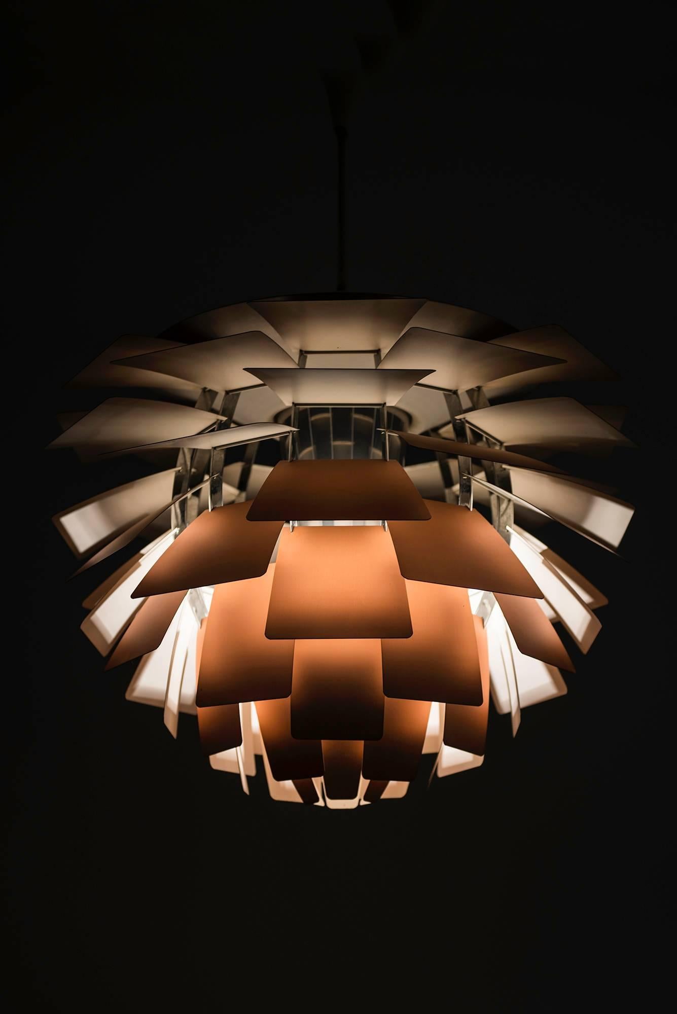 Rare and early Artichoke ceiling lamp designed by Poul Henningsen. Produced by Louis Poulsen in Denmark.